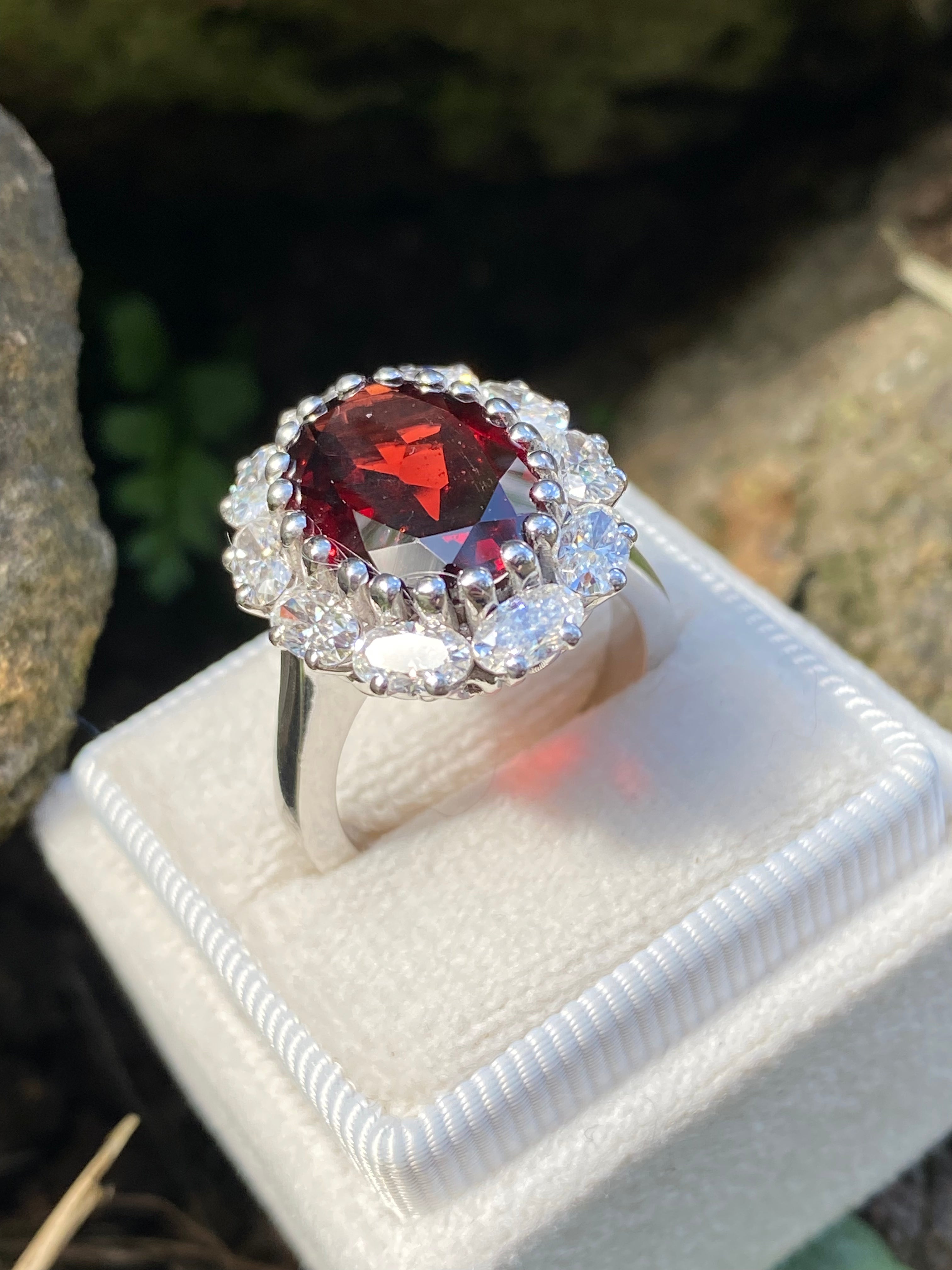 8.17 CTW Oval Cut Garnet and Moissanite Halo Cocktail Ring