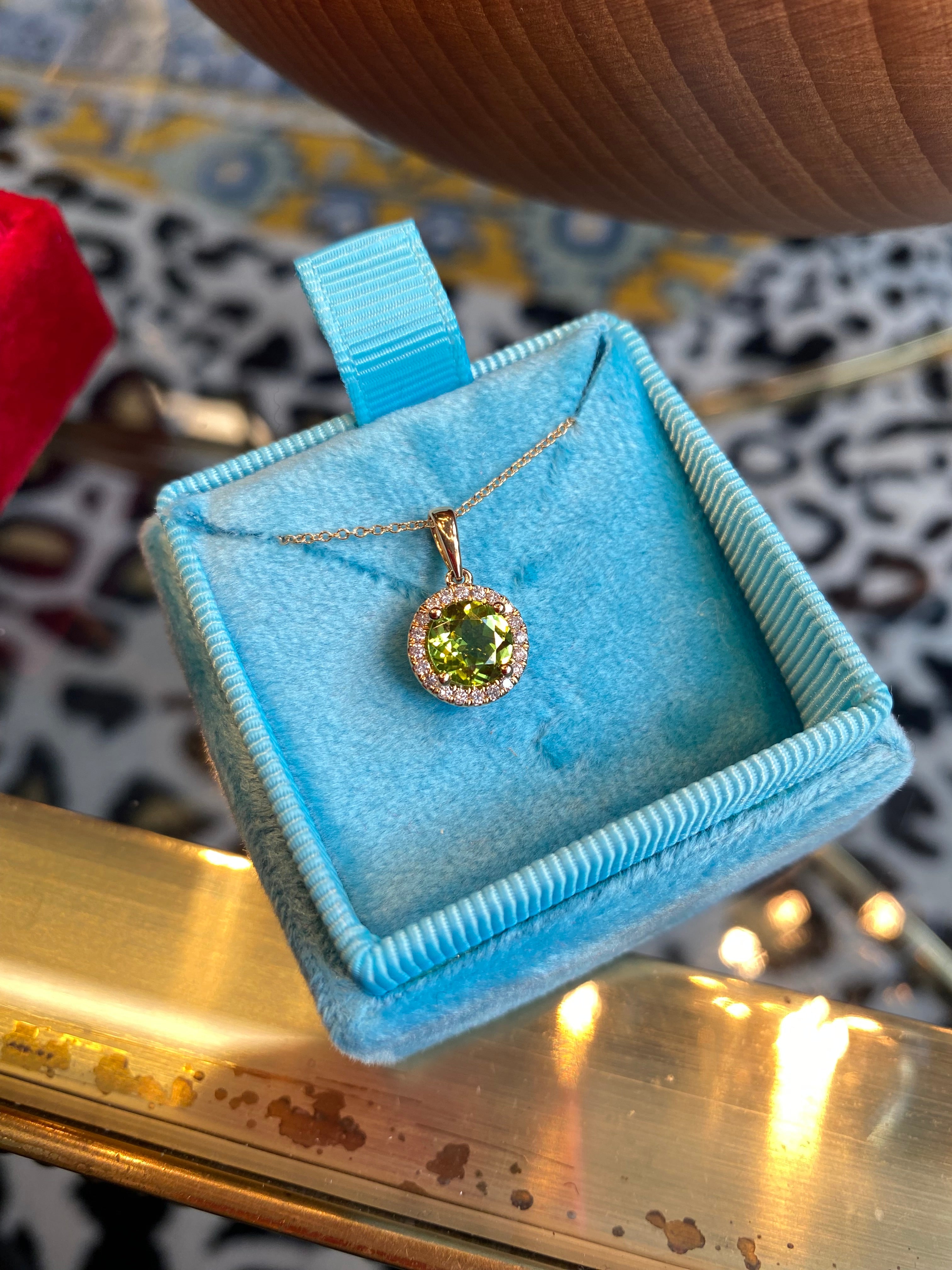 1.27 CTW Peridot and Natural Diamond Pendant Necklace in 9ct Yellow Gold
