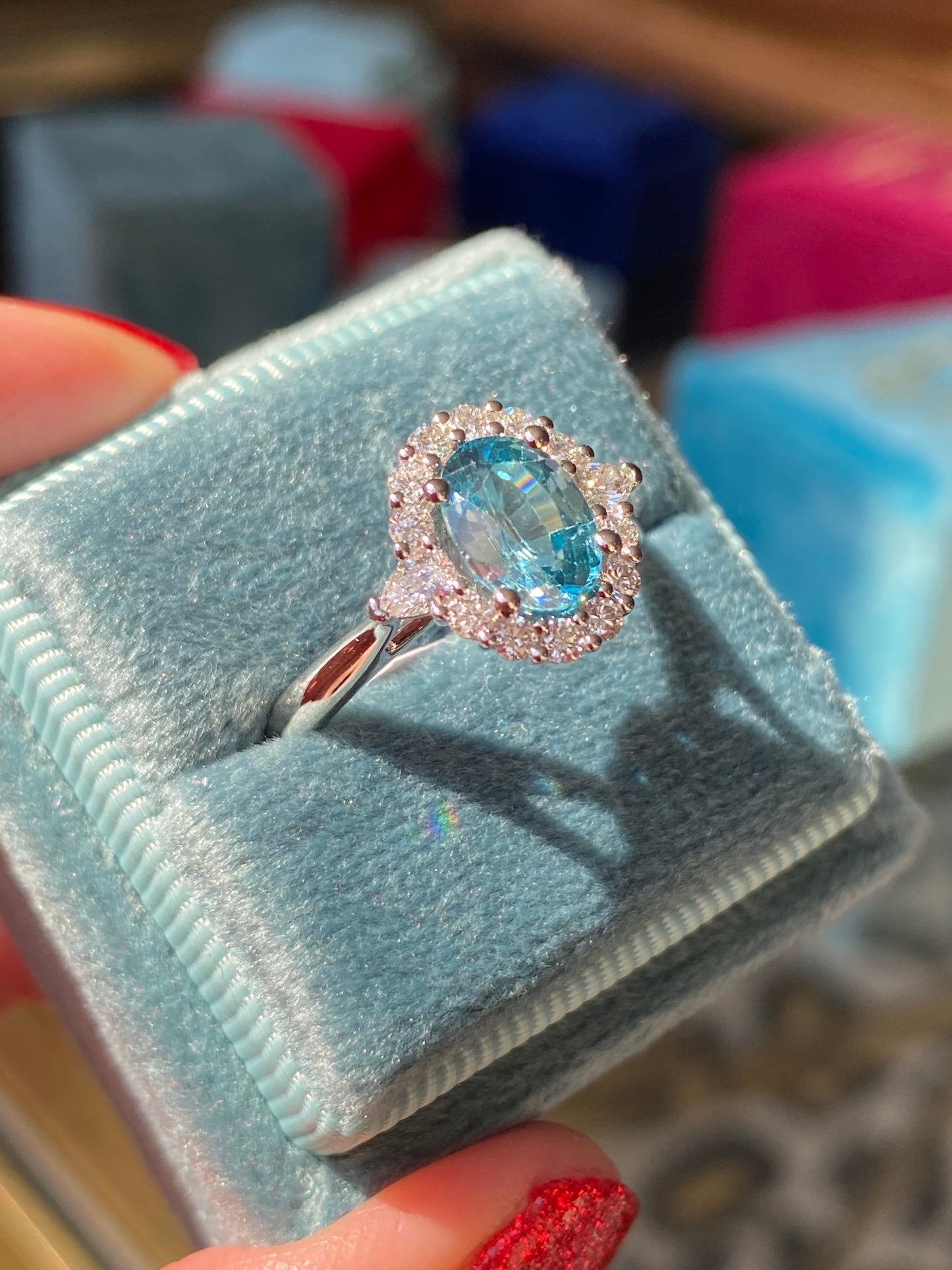 1.78 Carat Blue Zircon and Natural Diamond Halo Ring in Platinum