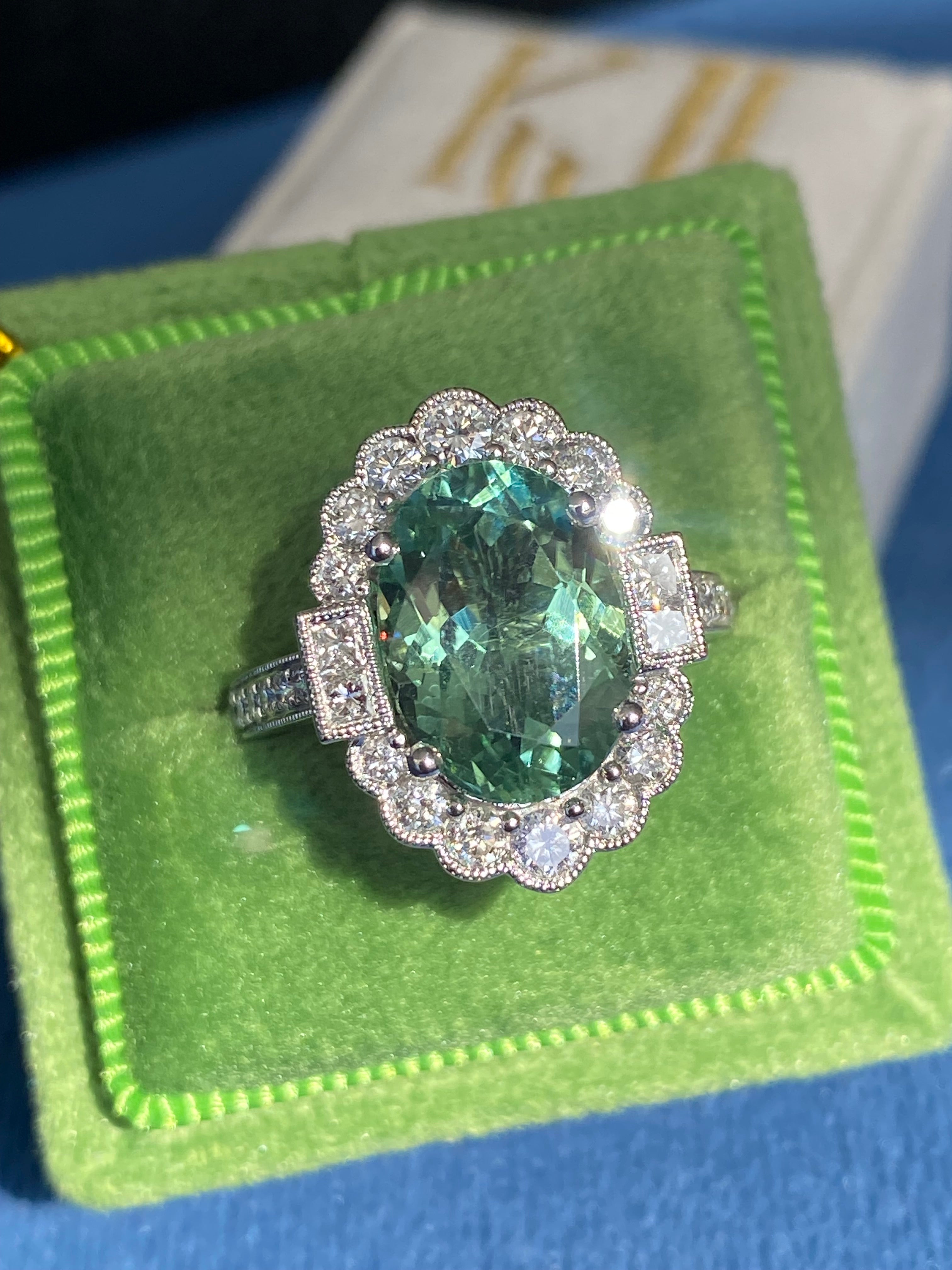4.07 Carat Oval Cut Mint Tourmaline and 0.80 CTW Natural Diamond Ring in Platinum