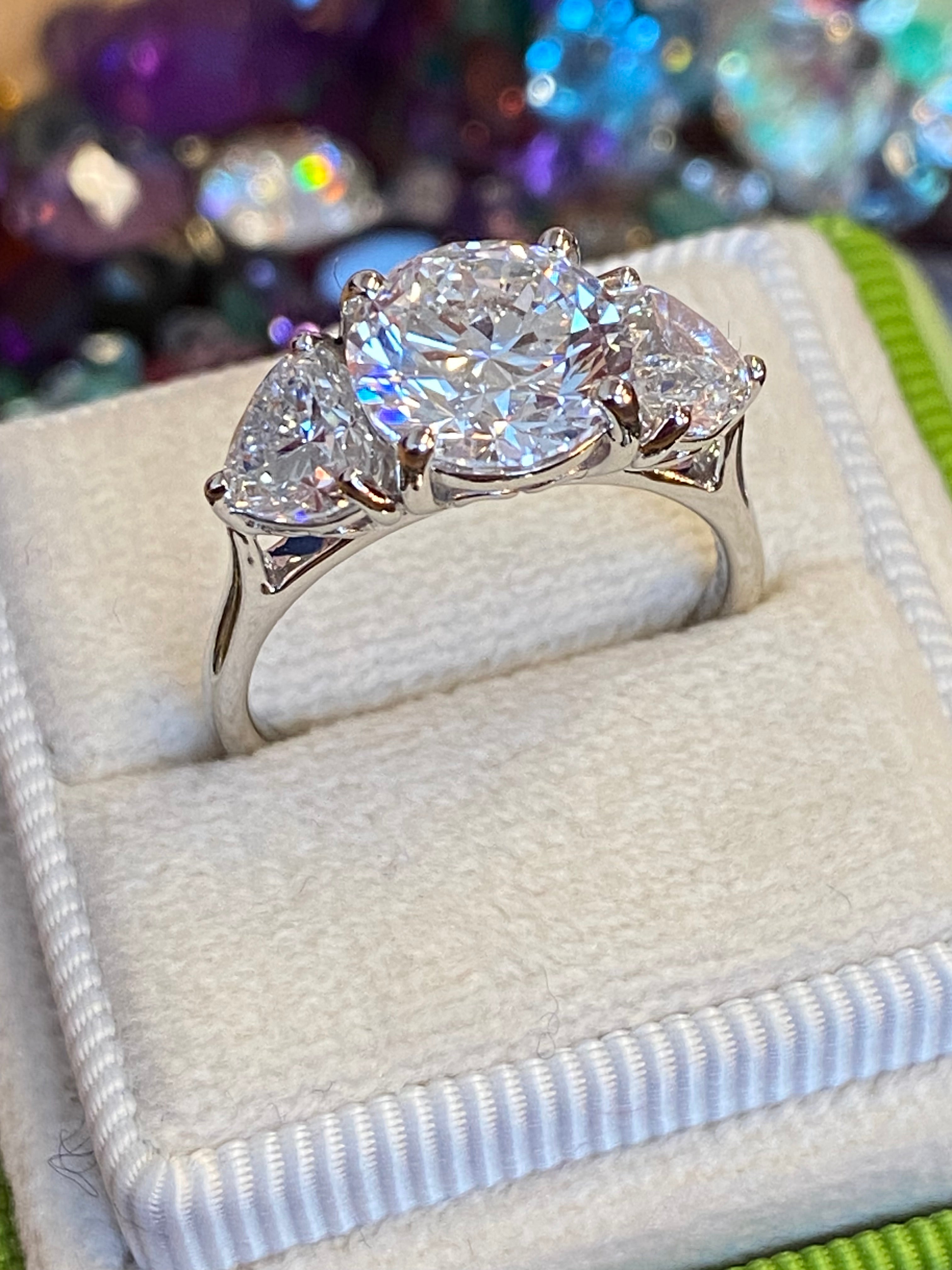 3.80CT + Brilliant Cut Oval and Heart Lab Grown Diamond Three Stone Engagement Ring, D Colour / VS Clarity in Platinum