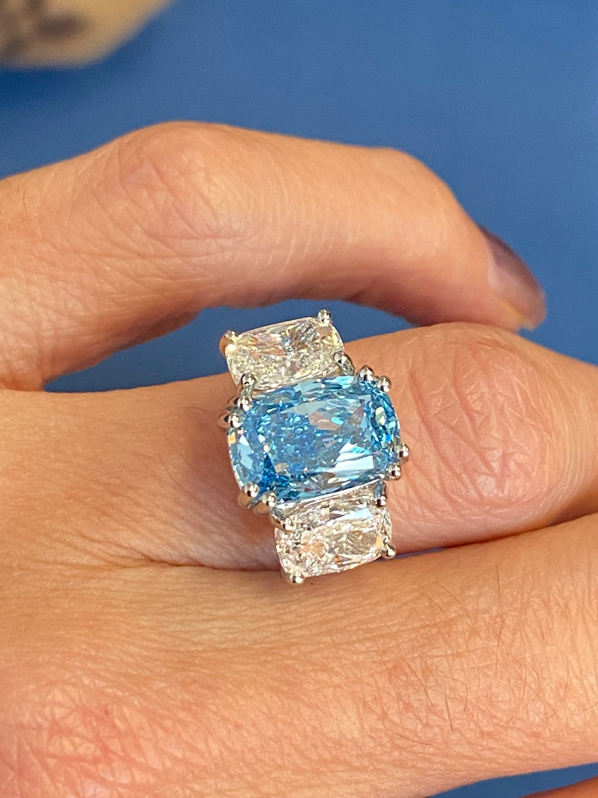 6.60 CTW Fancy Blue Cushion Cut Lab Diamond Graduated Three Stone Ring in Platinum