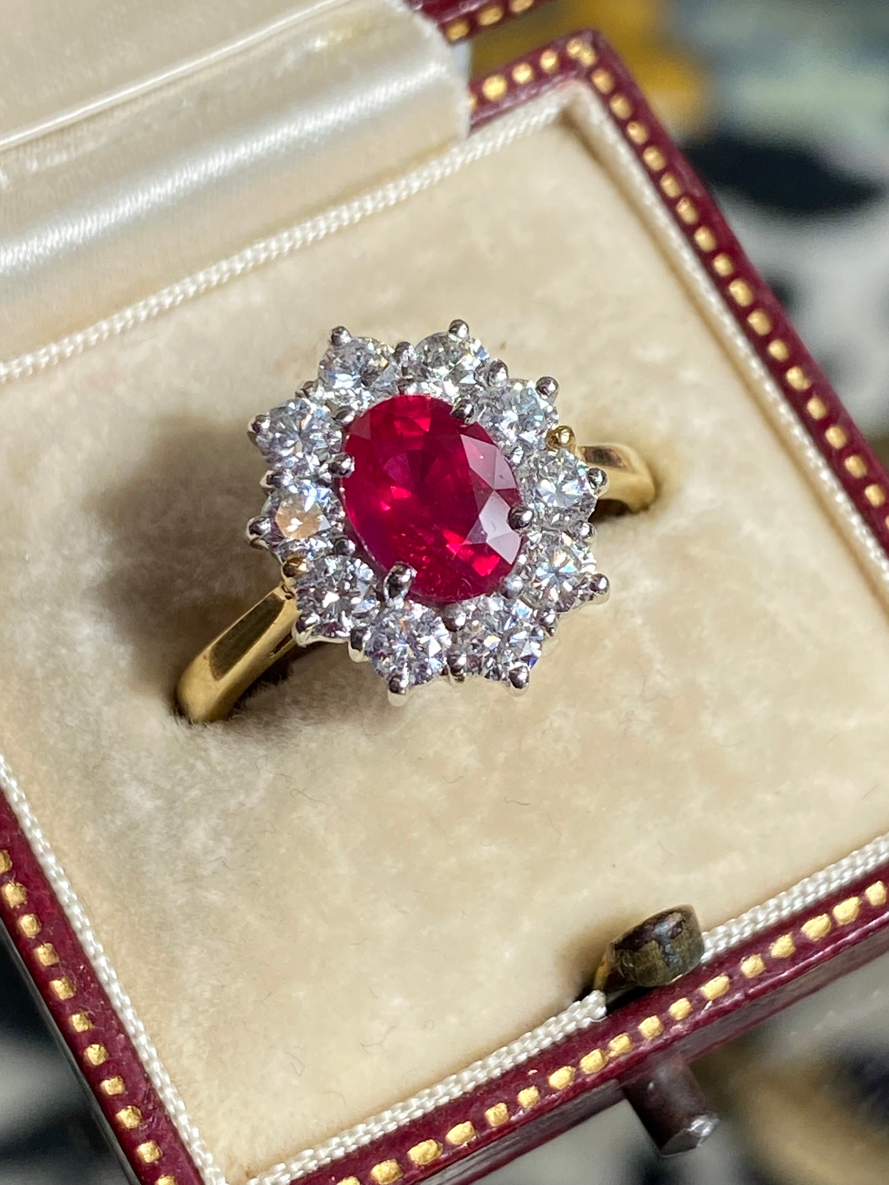 Breathtaking Ruby and Natural Diamond Halo Ring in 18ct Gold