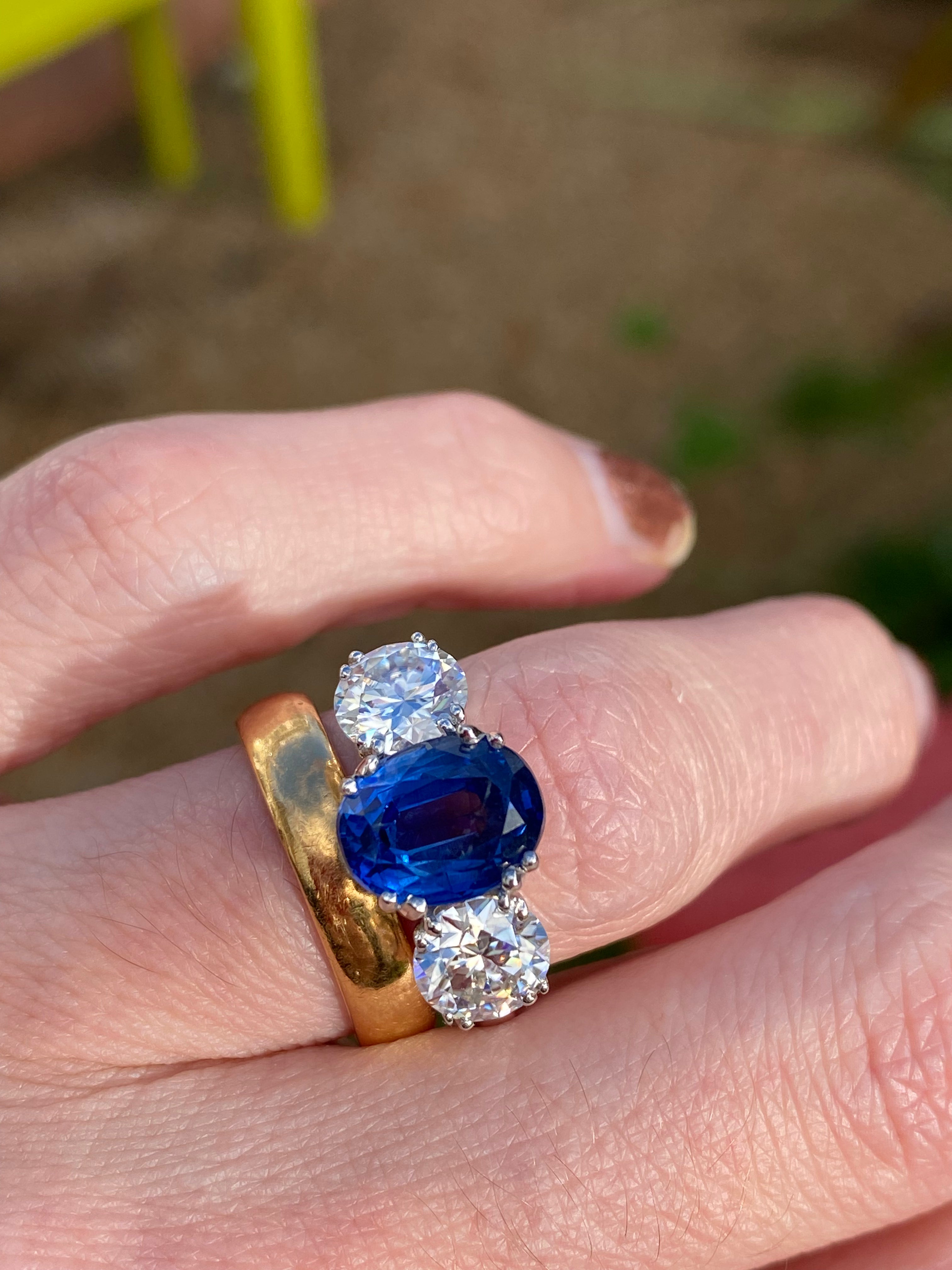 4.41 CTW Oval Cut Kyanite and Moissanite Three Stone Ring in Sterling Silver