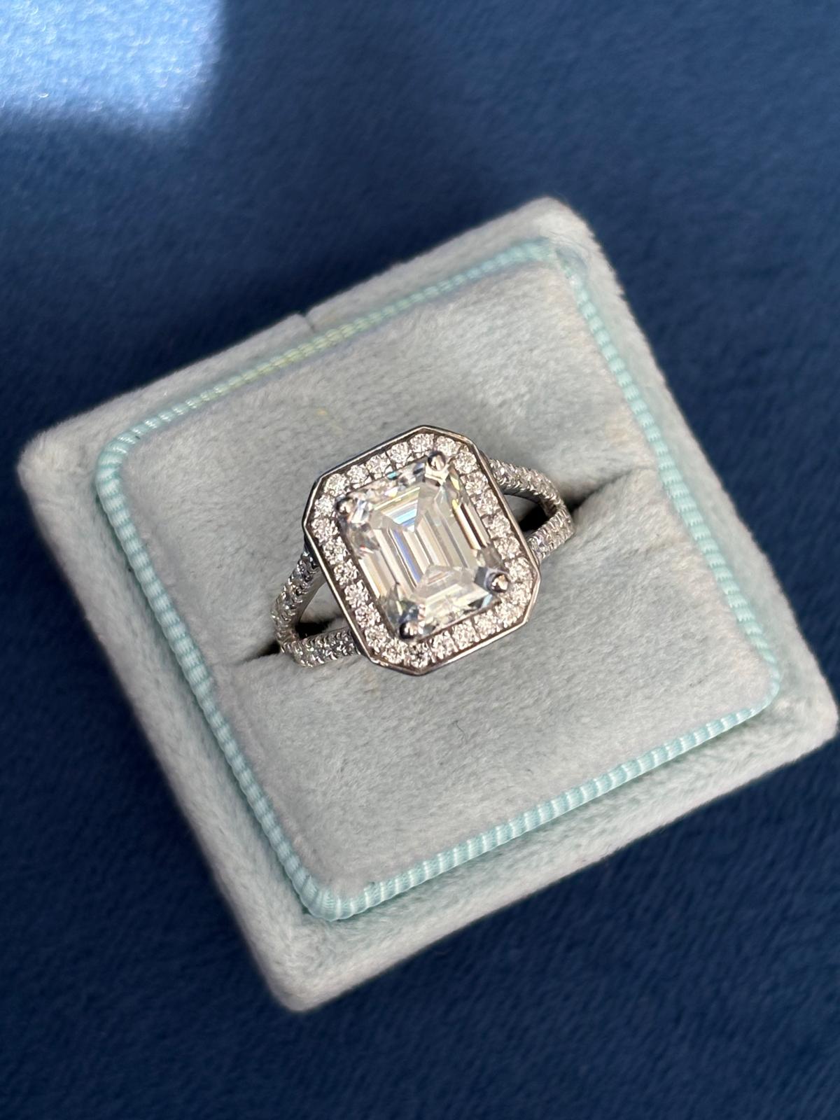 3.10 CTW Emerald Cut Moissanite Halo Ring in Sterling Silver