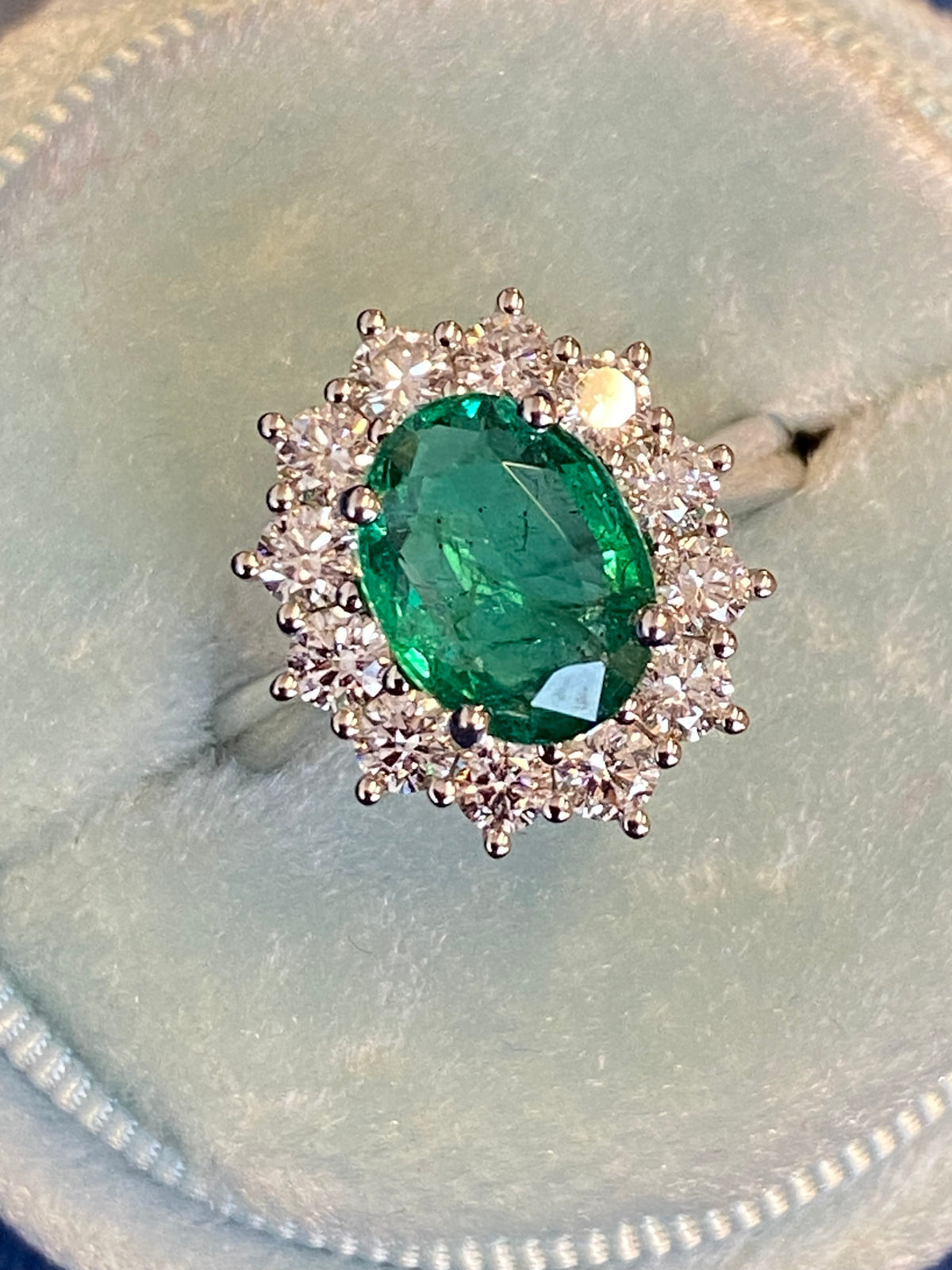 2.98 CTW Oval Cut Emerald and Natural Diamond Halo Ring in Platinum