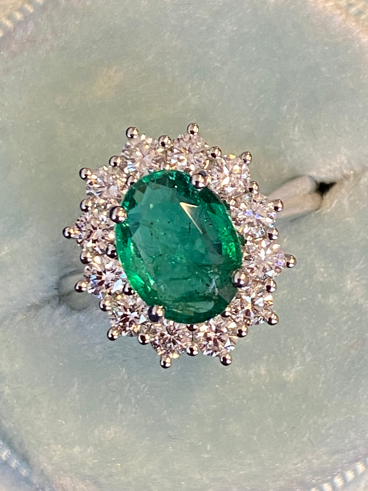 2.98 CTW Oval Cut Emerald and Natural Diamond Halo Ring in Platinum