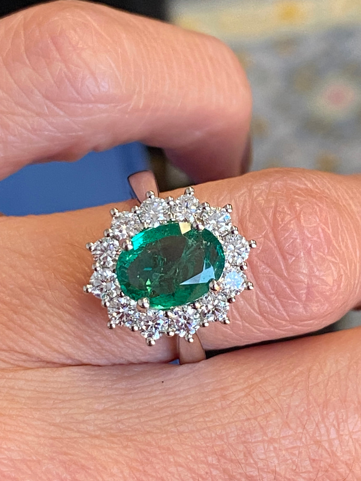 2.98 CTW Oval Cut Emerald and Natural Diamond Halo Ring in Platinum