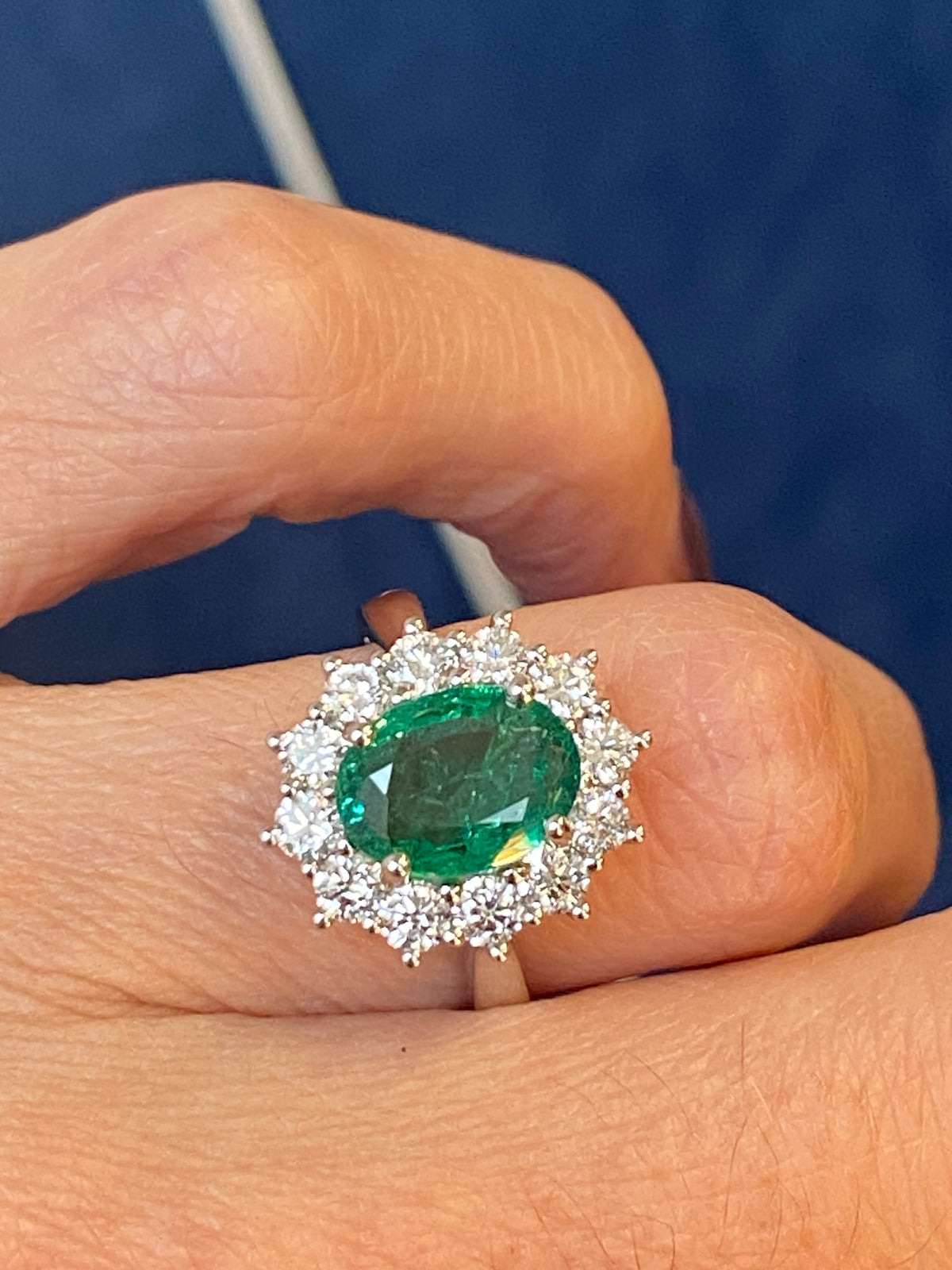 2.98 CTW Oval Cut Emerald and Natural Diamond Halo Ring in Platinum