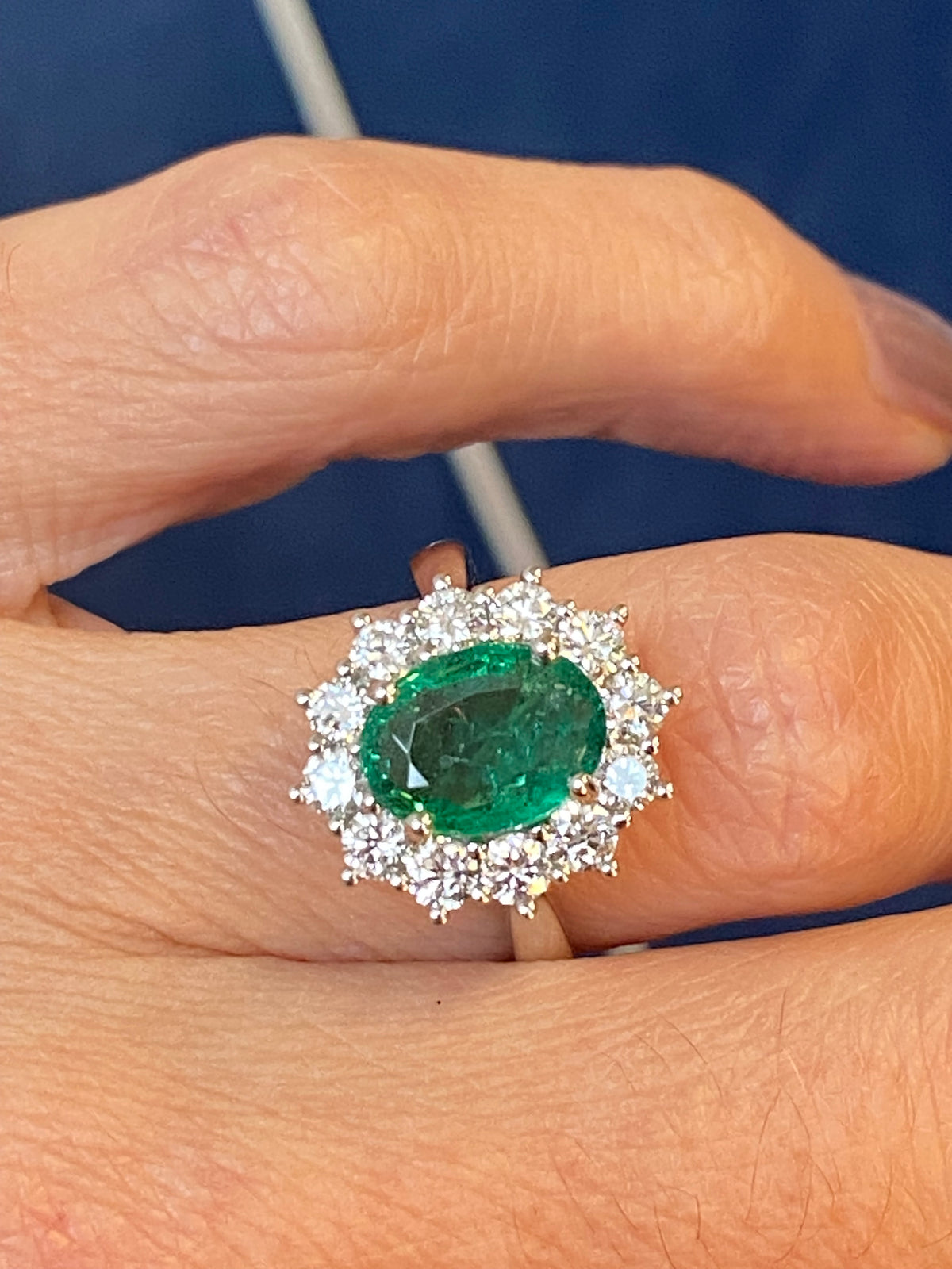 2.98 CTW Oval Cut Emerald and Natural Diamond Halo Ring in Platinum