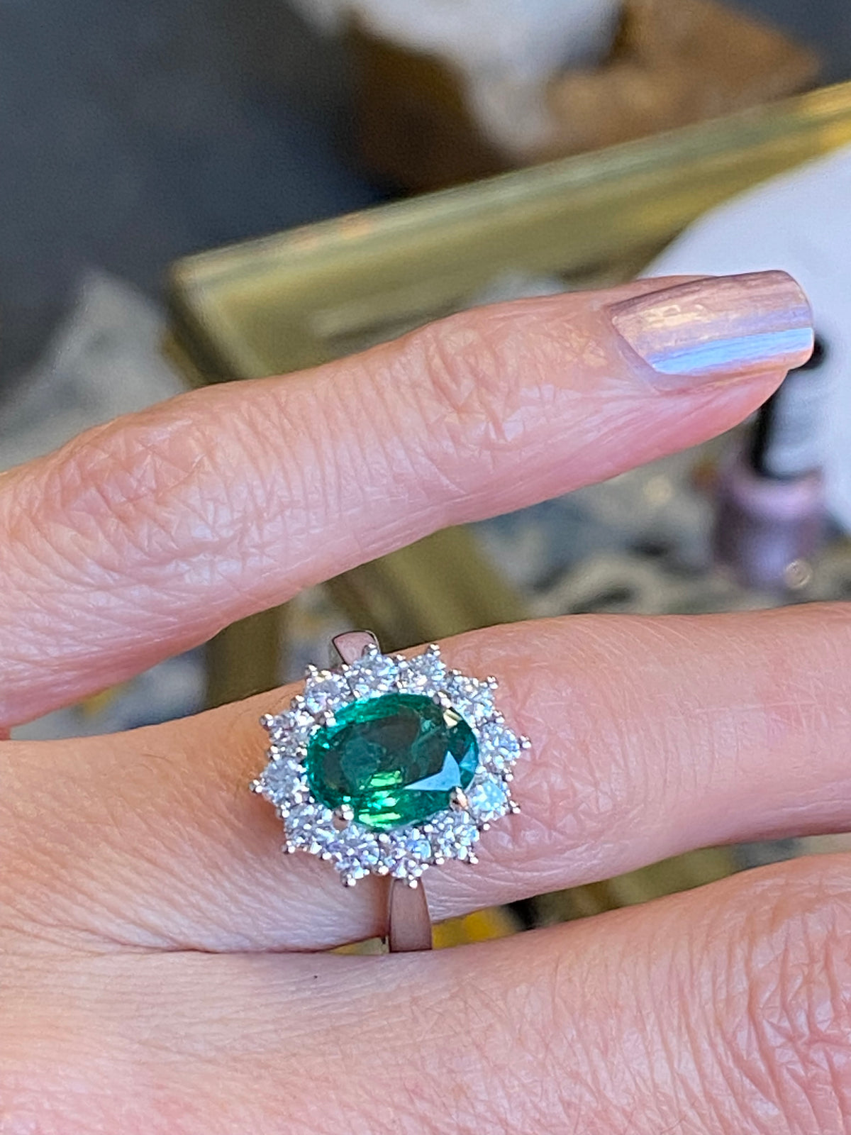 2.98 CTW Oval Cut Emerald and Natural Diamond Halo Ring in Platinum