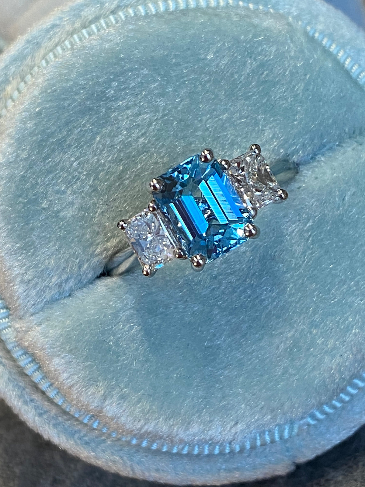 1.59 Carat Aquamarine and 0.80 CTW Natural Diamond Three-Stone Ring in Platinum
