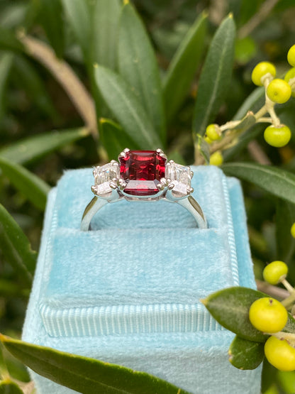 3.50 CTW Emerald Cut Garnet and Moissanite Three Stone Ring in Sterling Silver