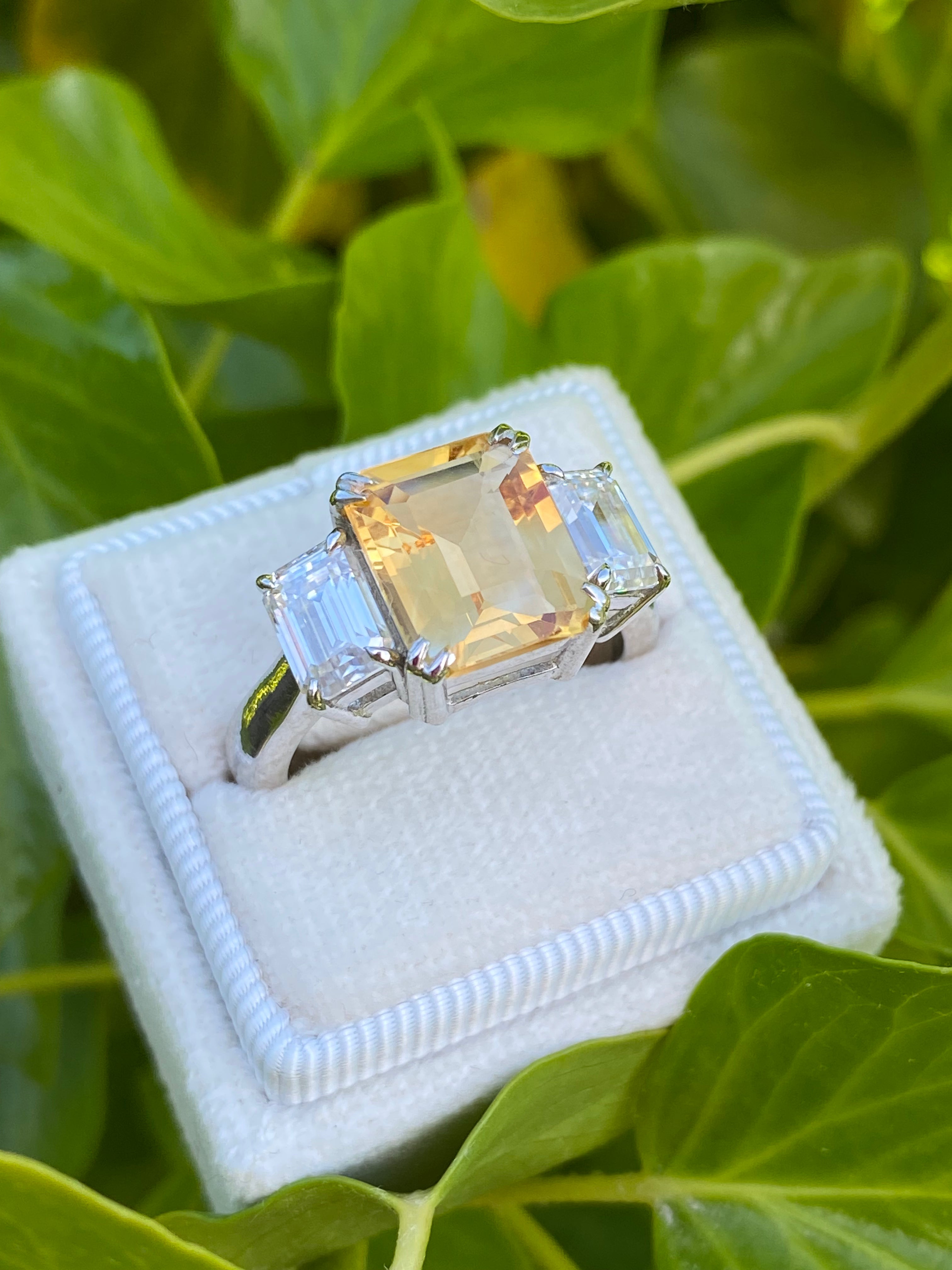 3.83 Carat Emerald Cut Citrine and 1.20 Carat Moissanite Three Stone Ring in Sterling Silver