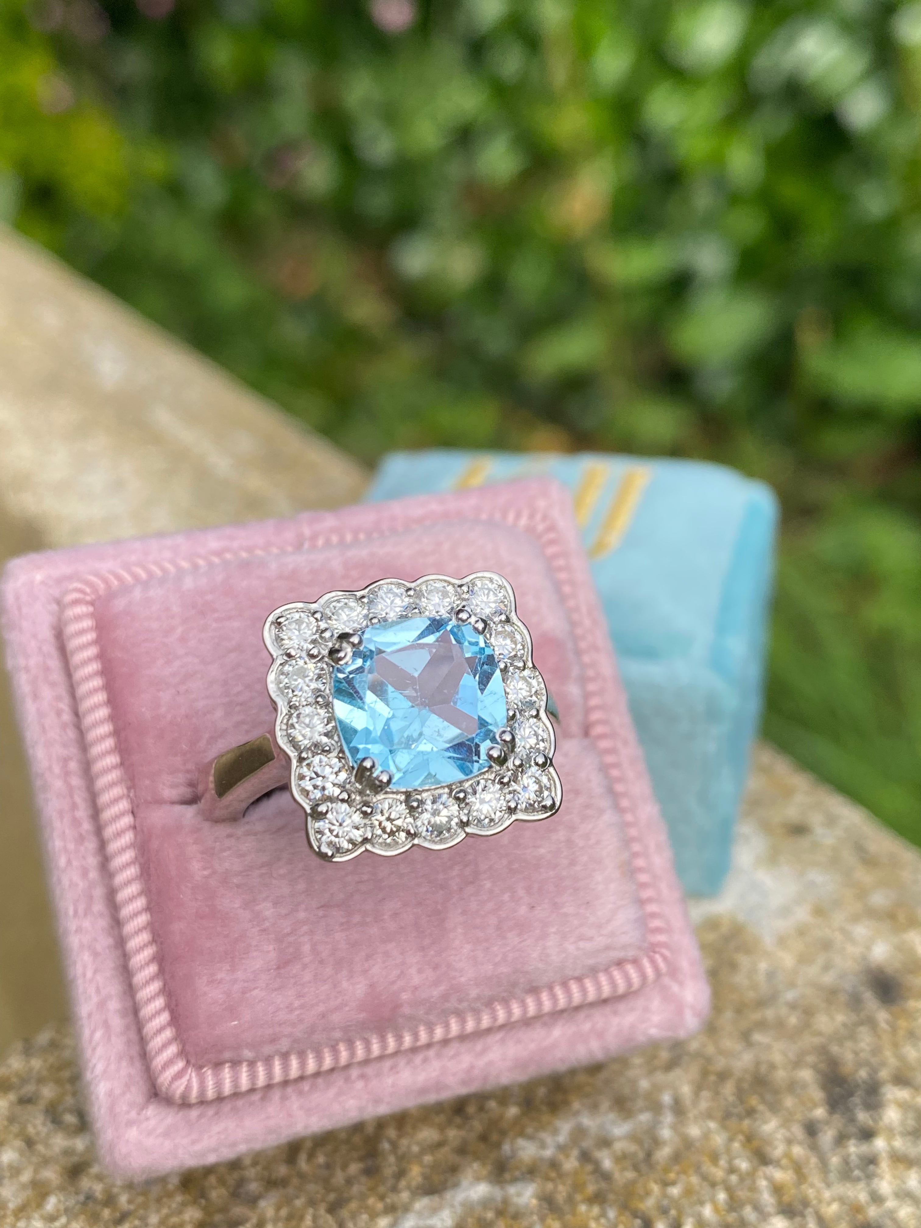 4.29 CTW Cushion Cut Blue Topaz and Moissanite Halo Cocktail Ring in Sterling Silver