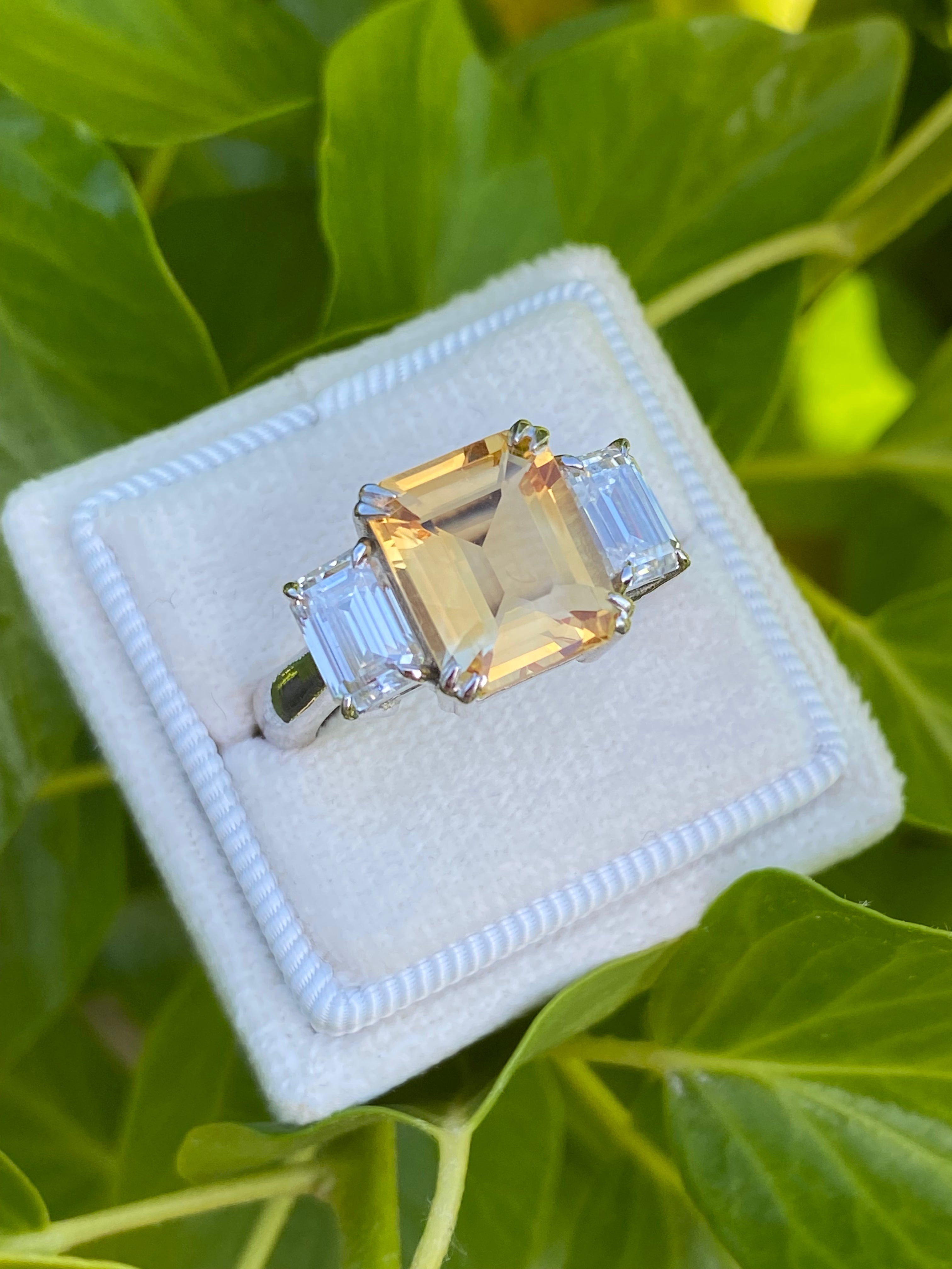 3.83 Carat Emerald Cut Citrine and 1.20 Carat Moissanite Three Stone Ring in Sterling Silver