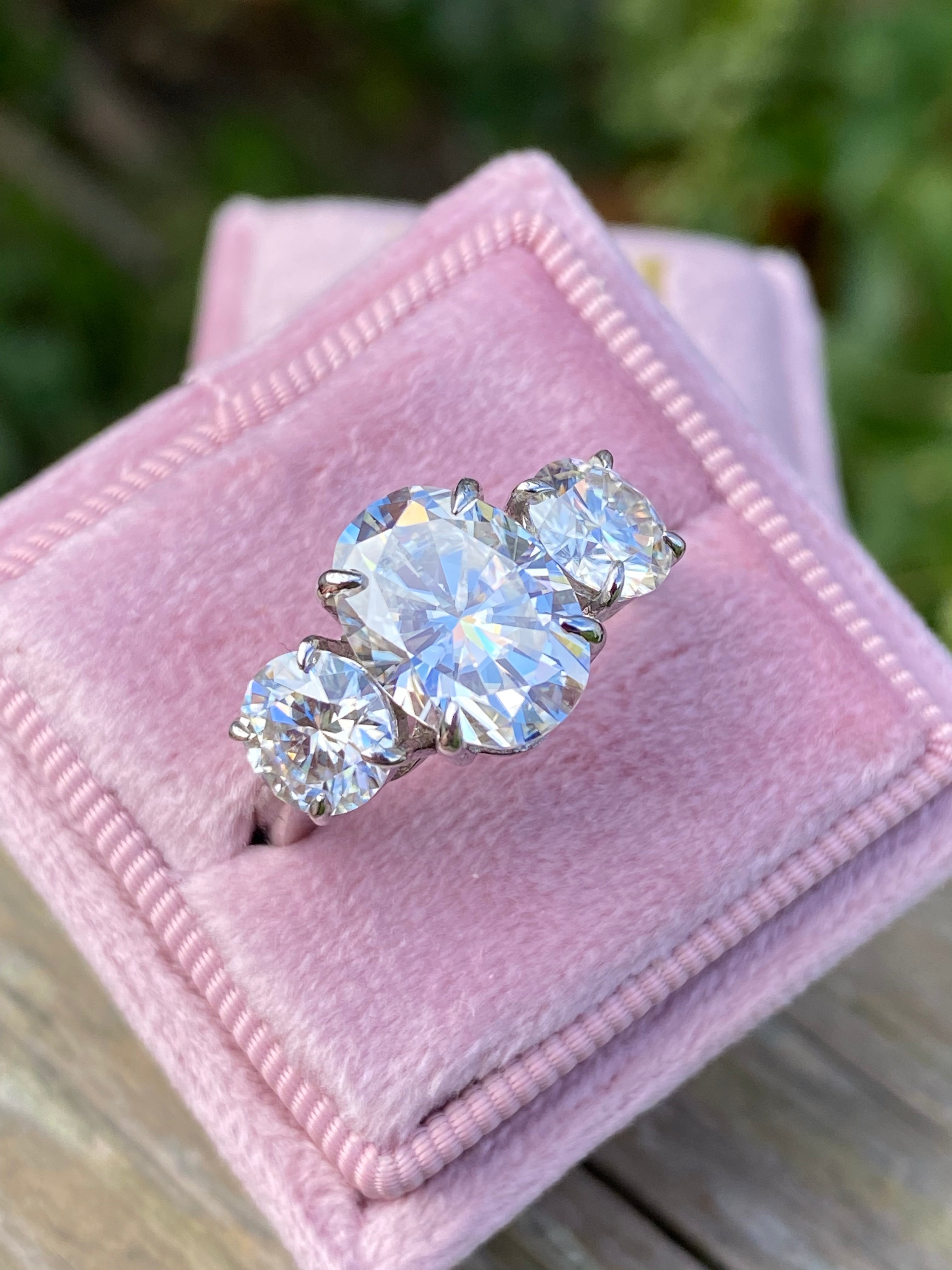 5.16 CTW Oval Cut Moissanite Three Stone Engagement Ring in Sterling Silver
