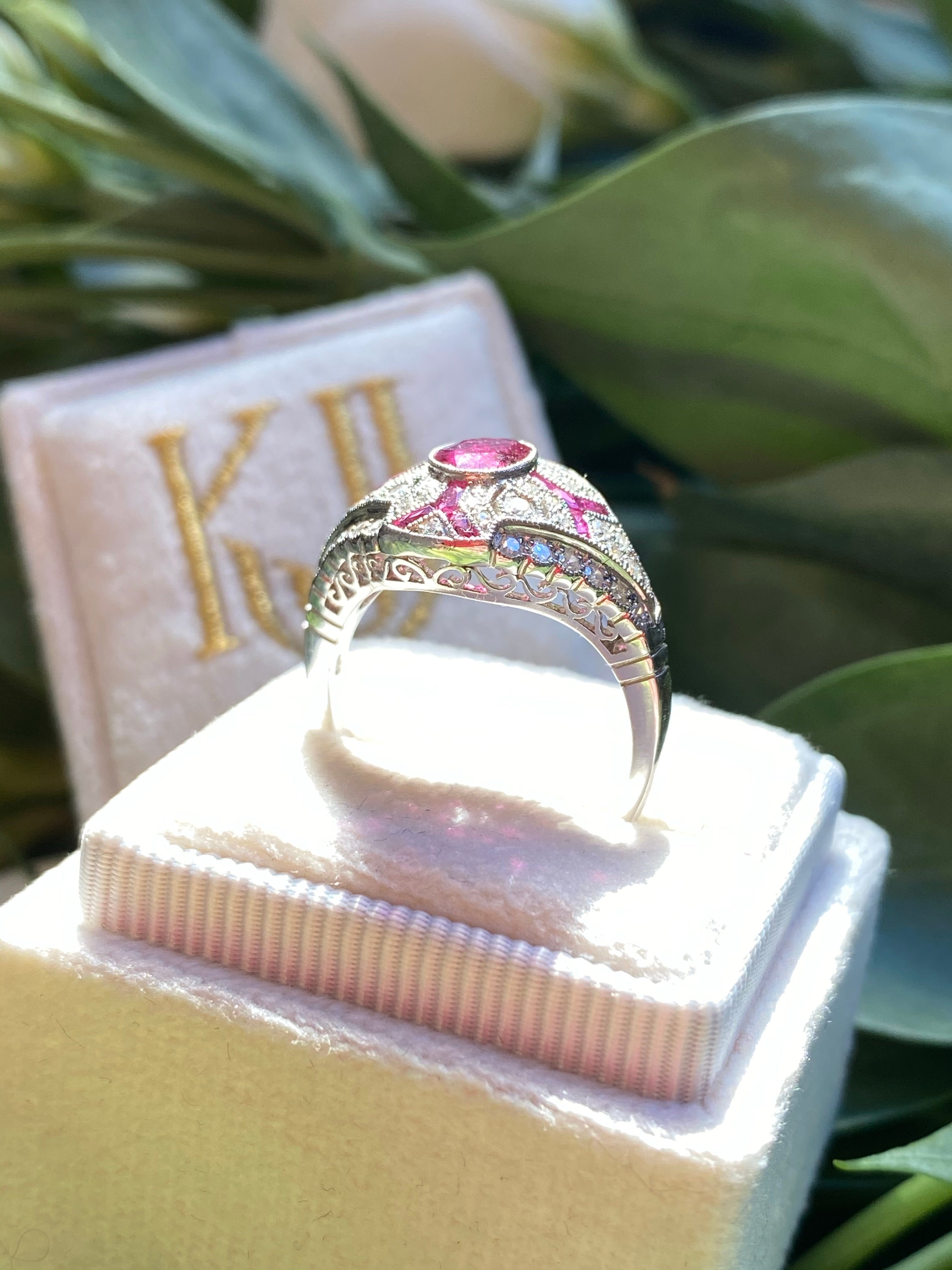 Oval Cut Ruby and Diamond Art Deco Ring in Platinum