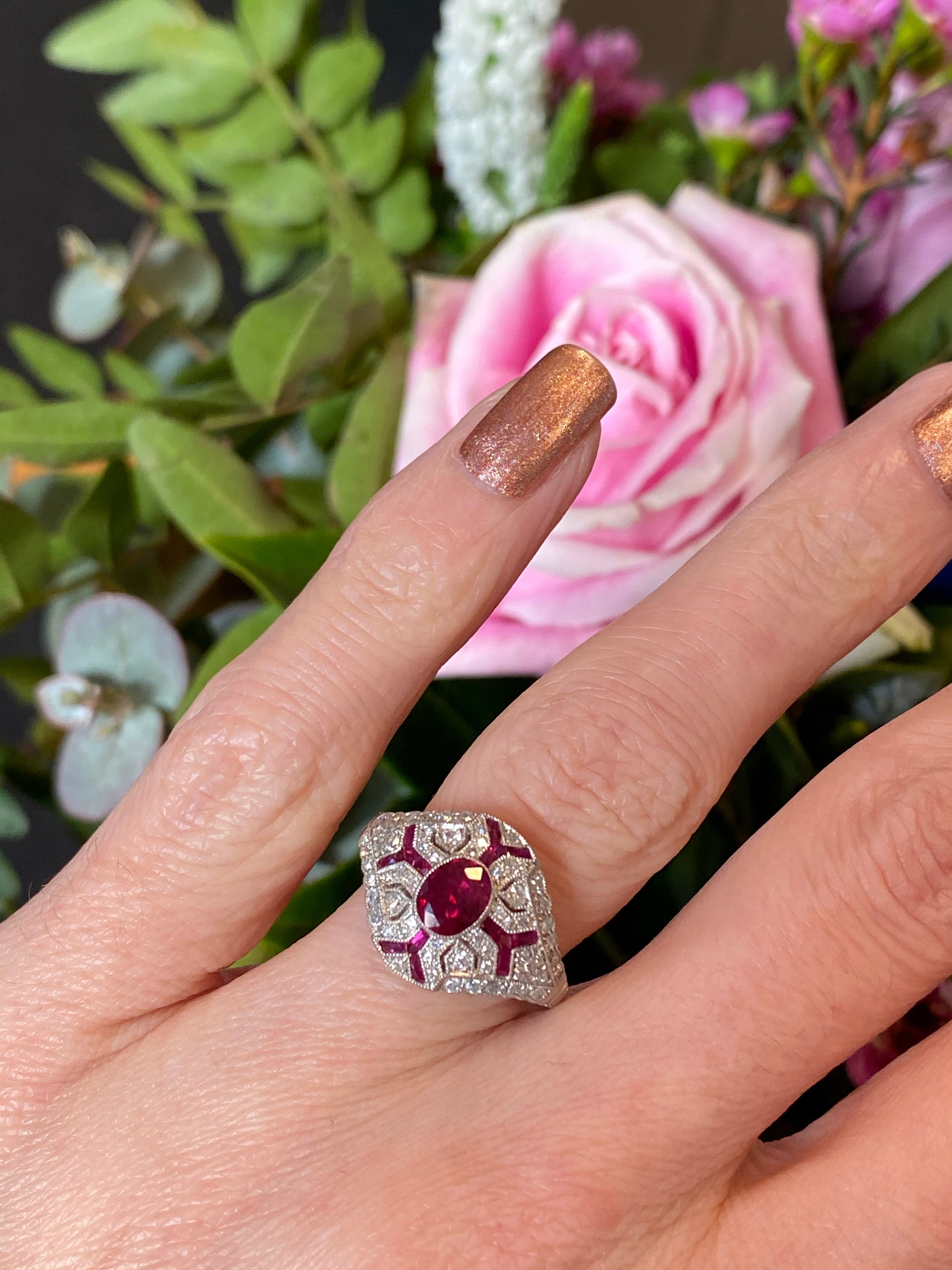 Oval Cut Ruby and Diamond Art Deco Ring in Platinum