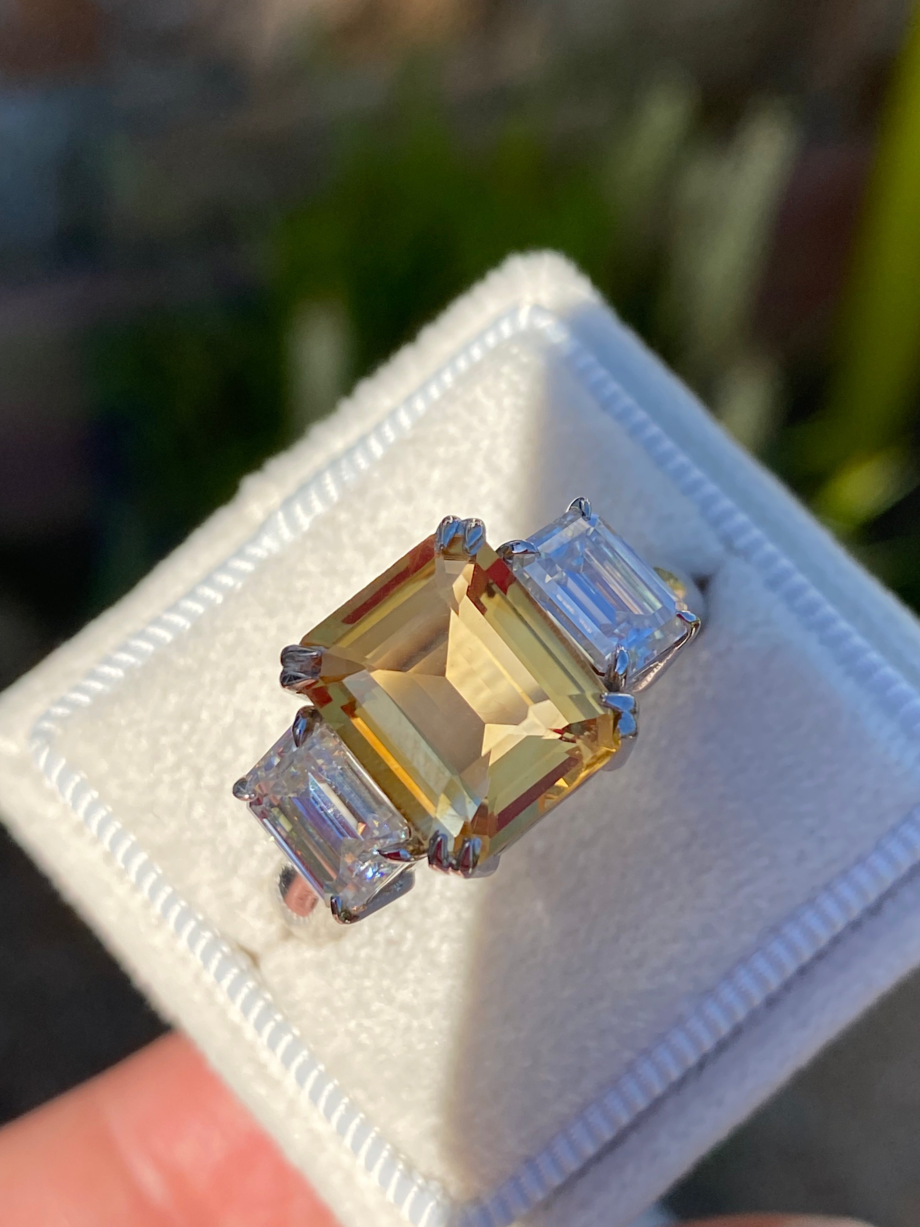 3.83 Carat Emerald Cut Citrine and 1.20 Carat Moissanite Three Stone Ring in Sterling Silver