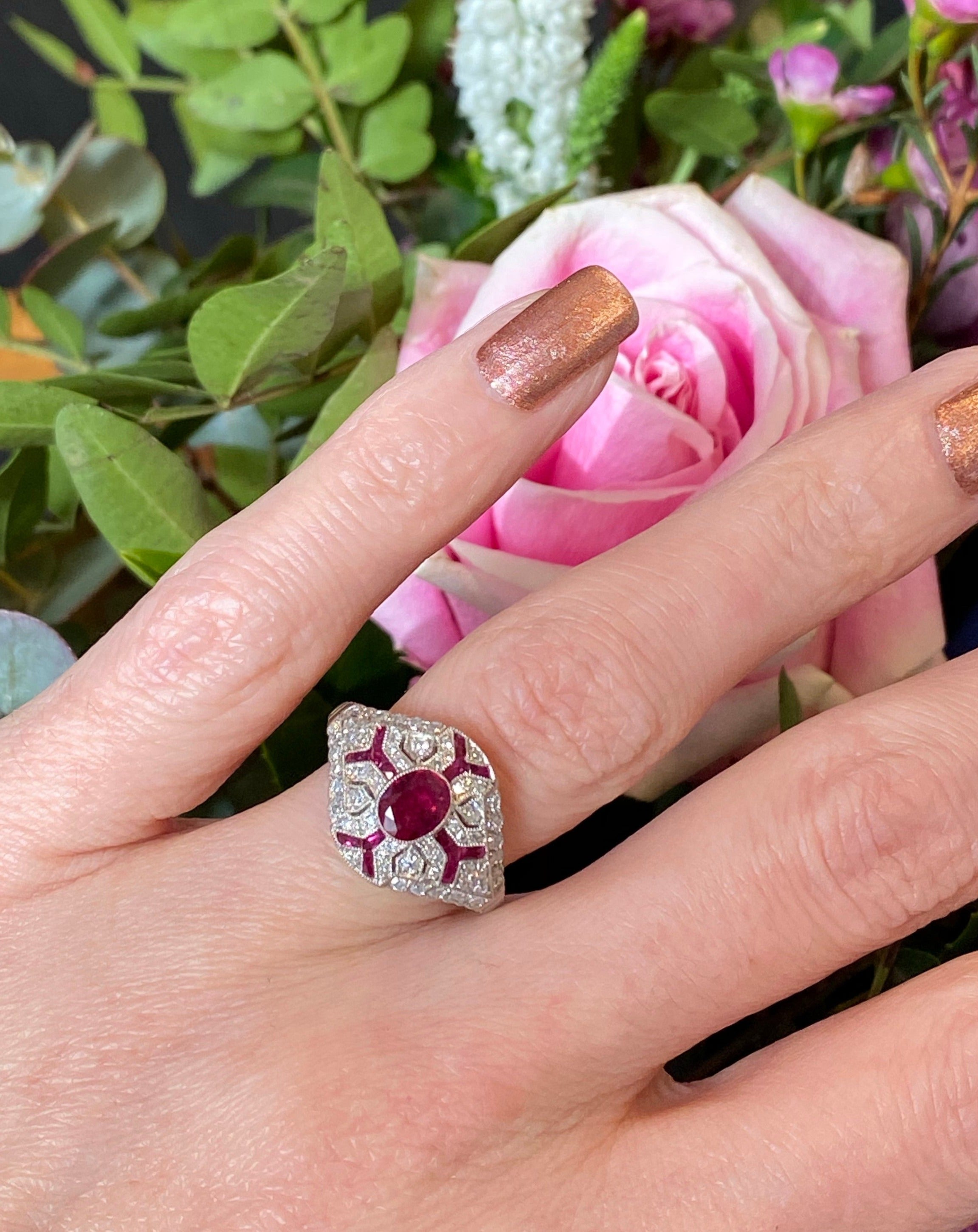 Oval Cut Ruby and Diamond Art Deco Engagement Ring in Platinum