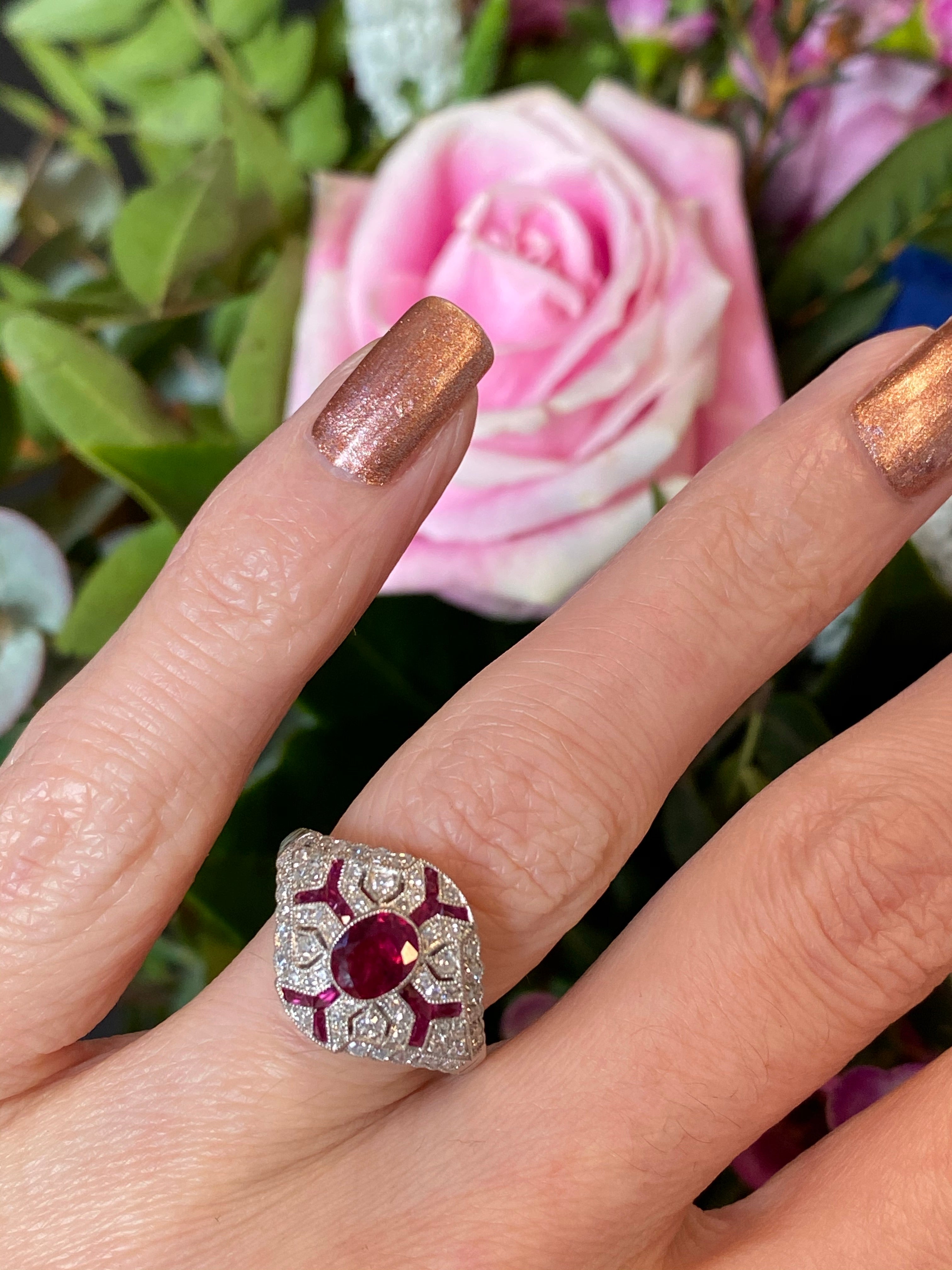 Oval Cut Ruby and Diamond Art Deco Ring in Platinum