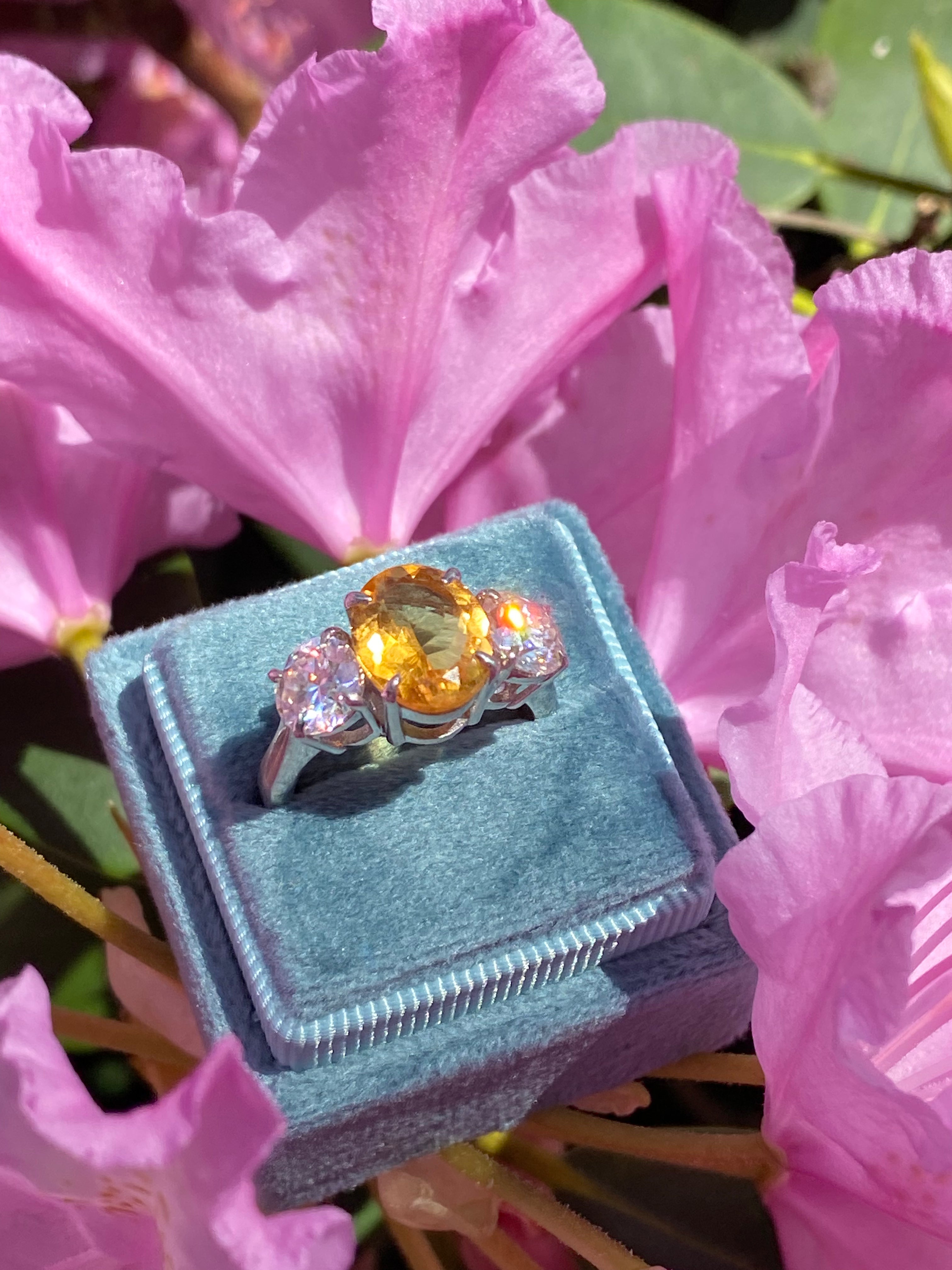 2.66 Carat Oval Cut Citrine and 1.85 Carat Moissanite Three Stone Ring in Sterling Silver