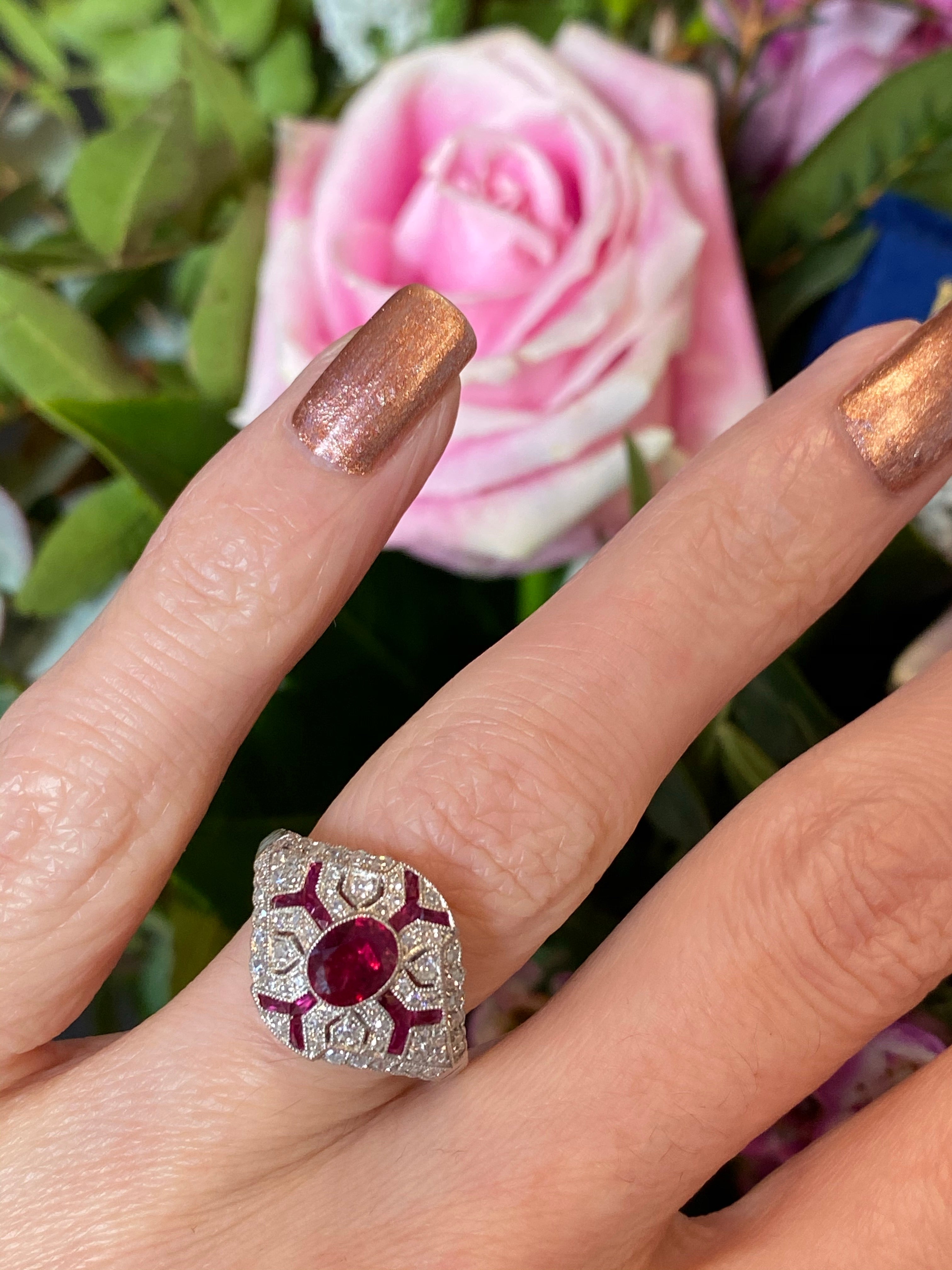 Oval Cut Ruby and Diamond Art Deco Engagement Ring in Platinum