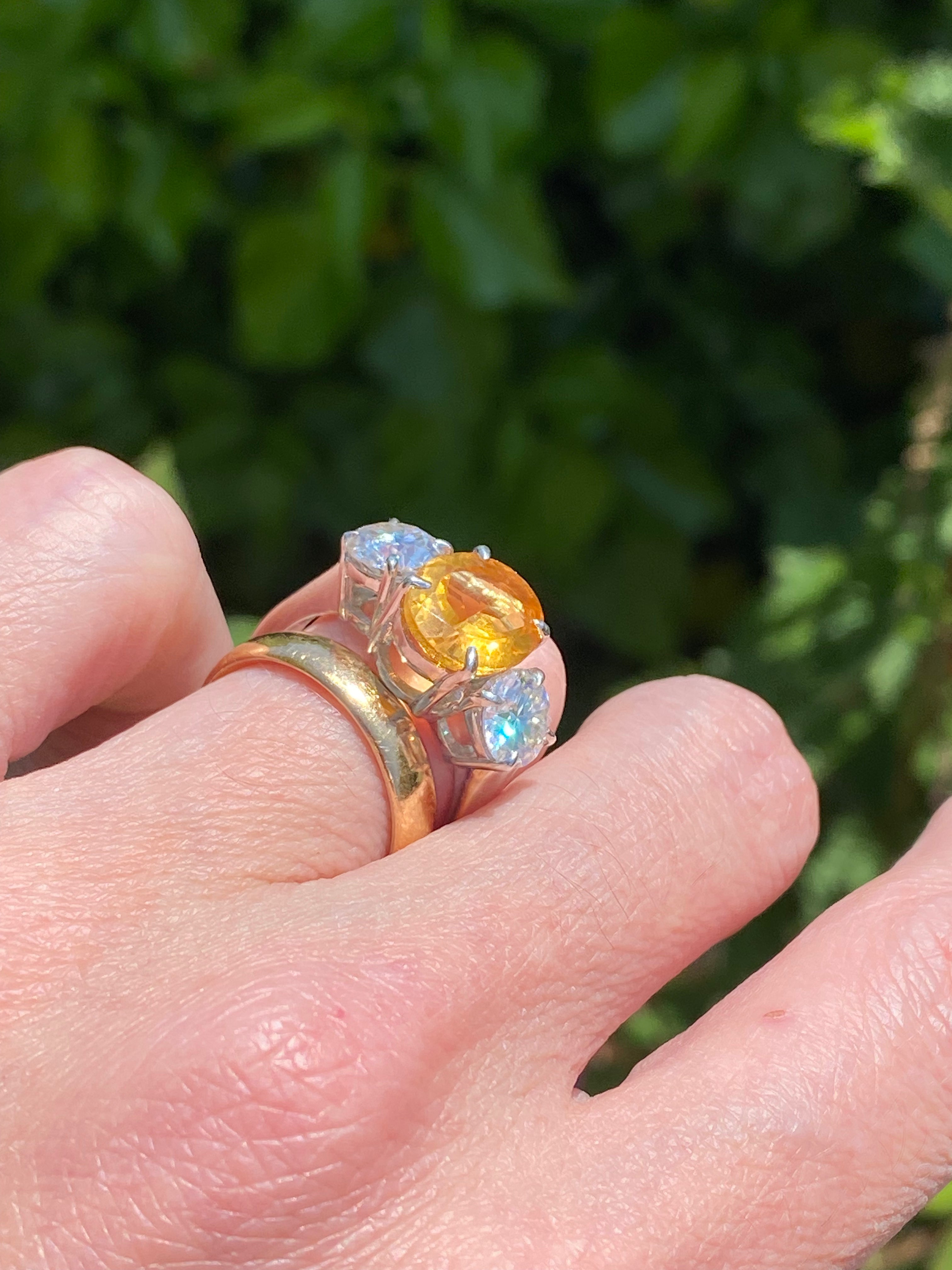 2.66 Carat Oval Cut Citrine and 1.85 Carat Moissanite Three Stone Ring in Sterling Silver
