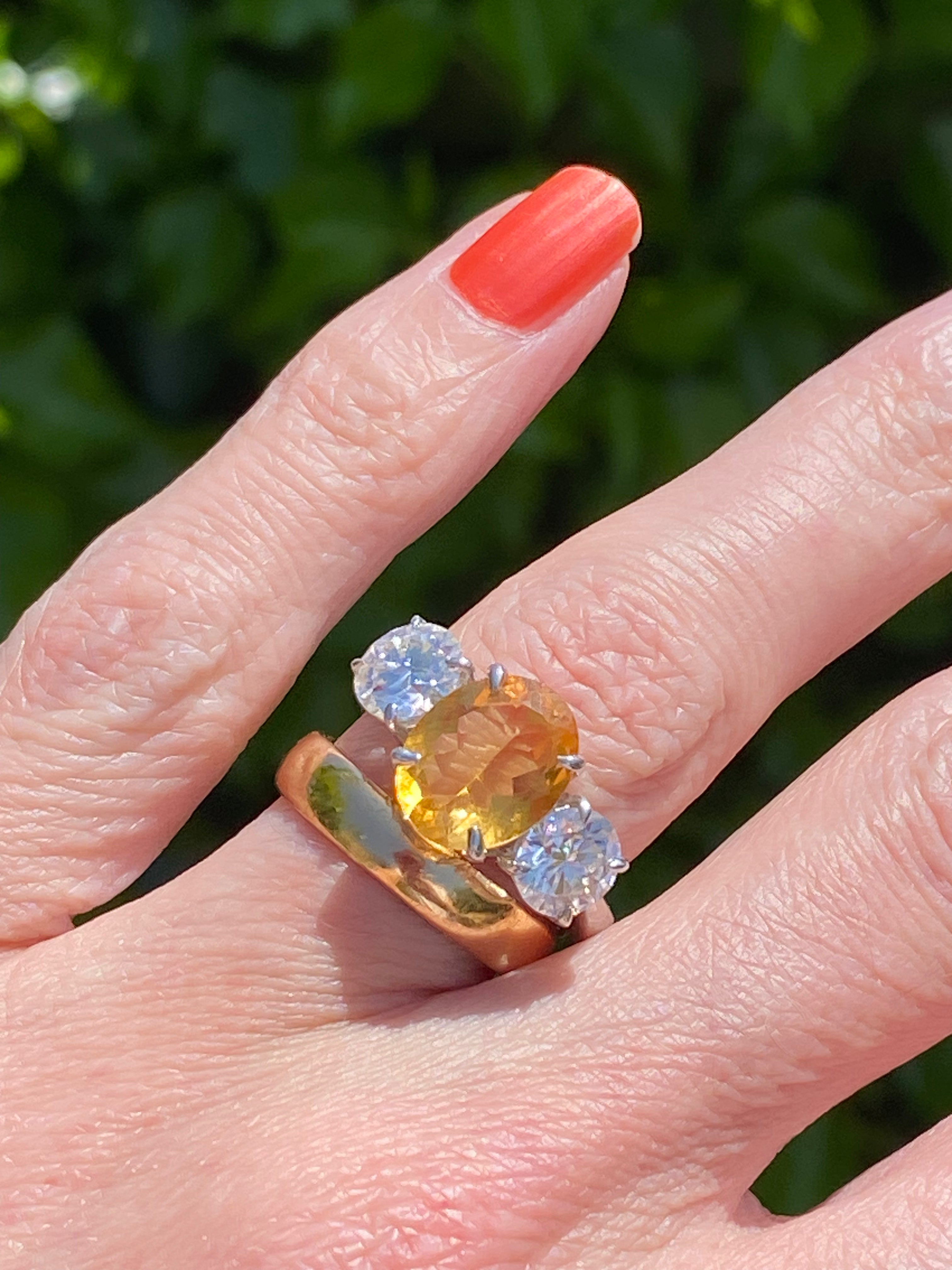2.66 Carat Oval Cut Citrine and 1.85 Carat Moissanite Three Stone Ring in Sterling Silver
