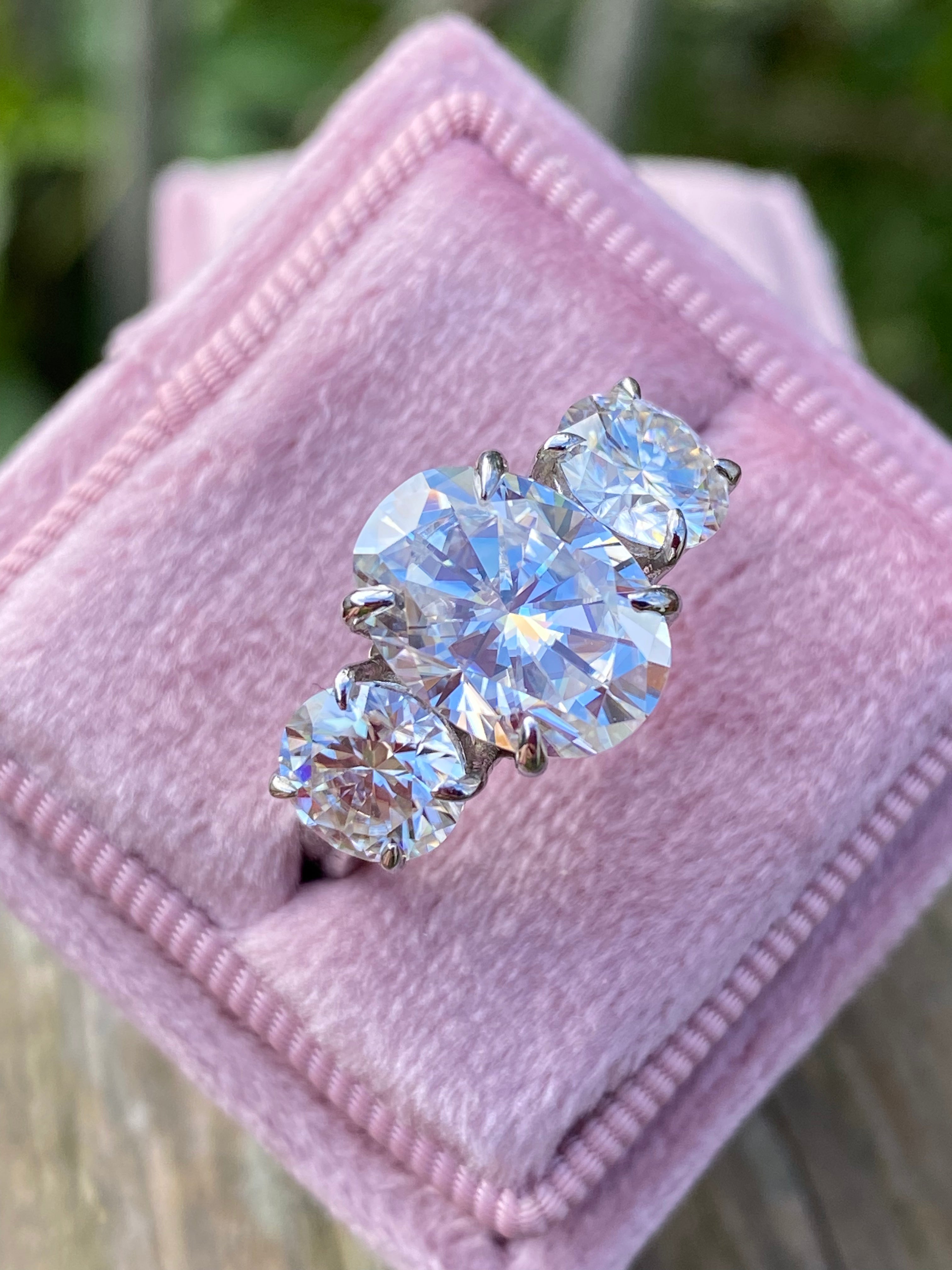 5.16 CTW Oval Cut Moissanite Three Stone Engagement Ring in Sterling Silver