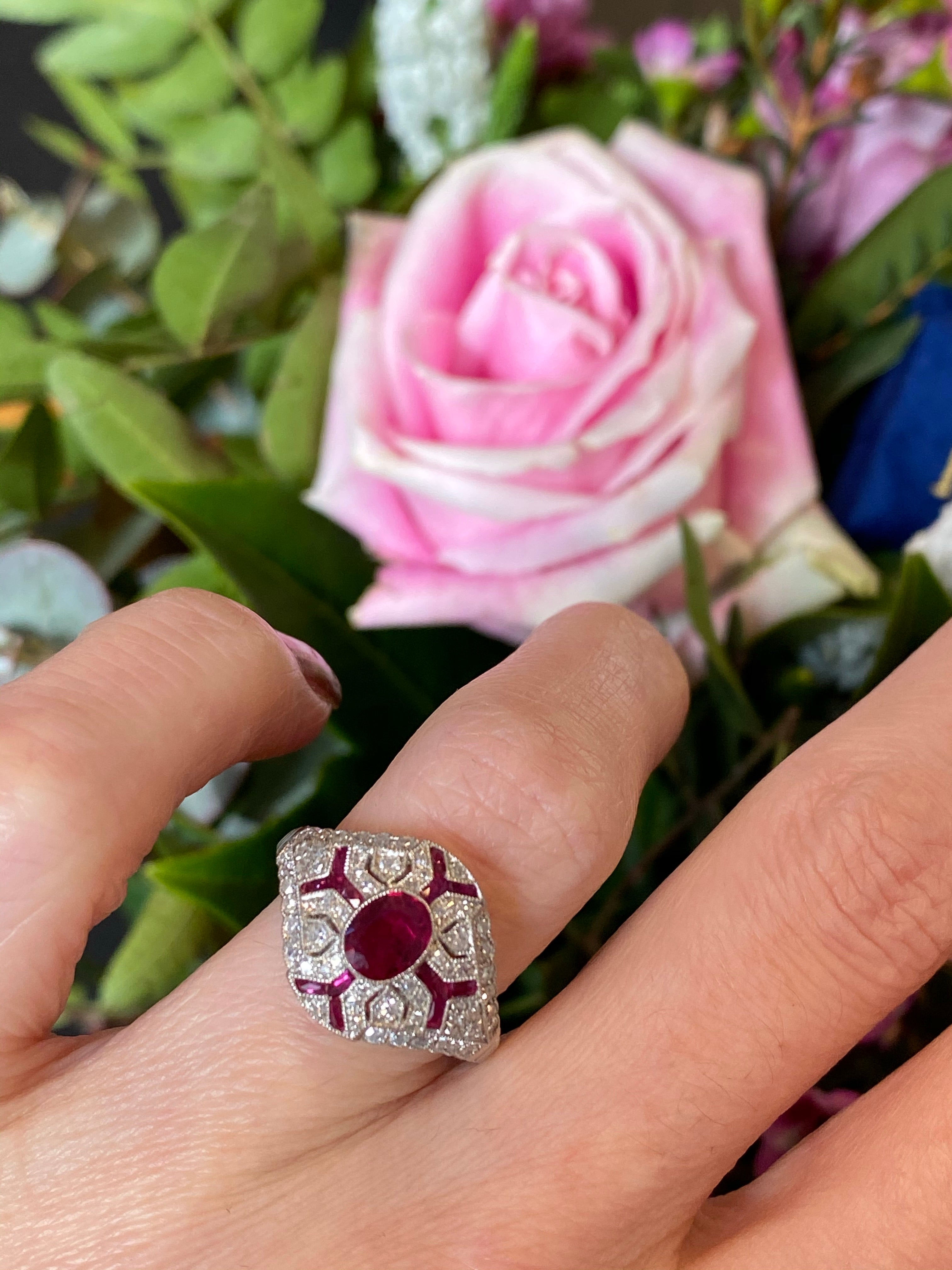 Oval Cut Ruby and Diamond Art Deco Engagement Ring in Platinum