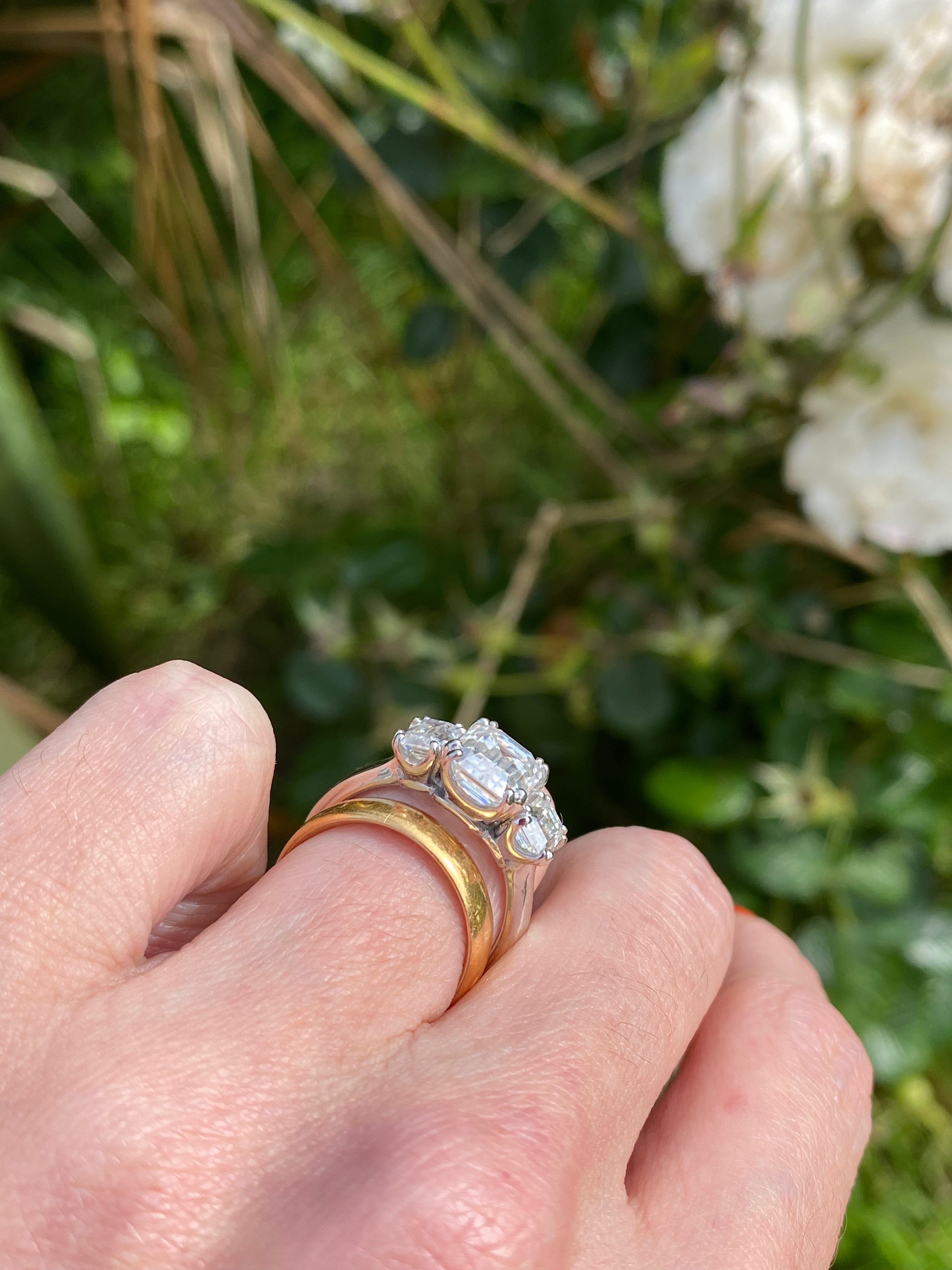 3.50 CTW Emerald Cut Moissanite Three Stone Ring in Sterling Silver