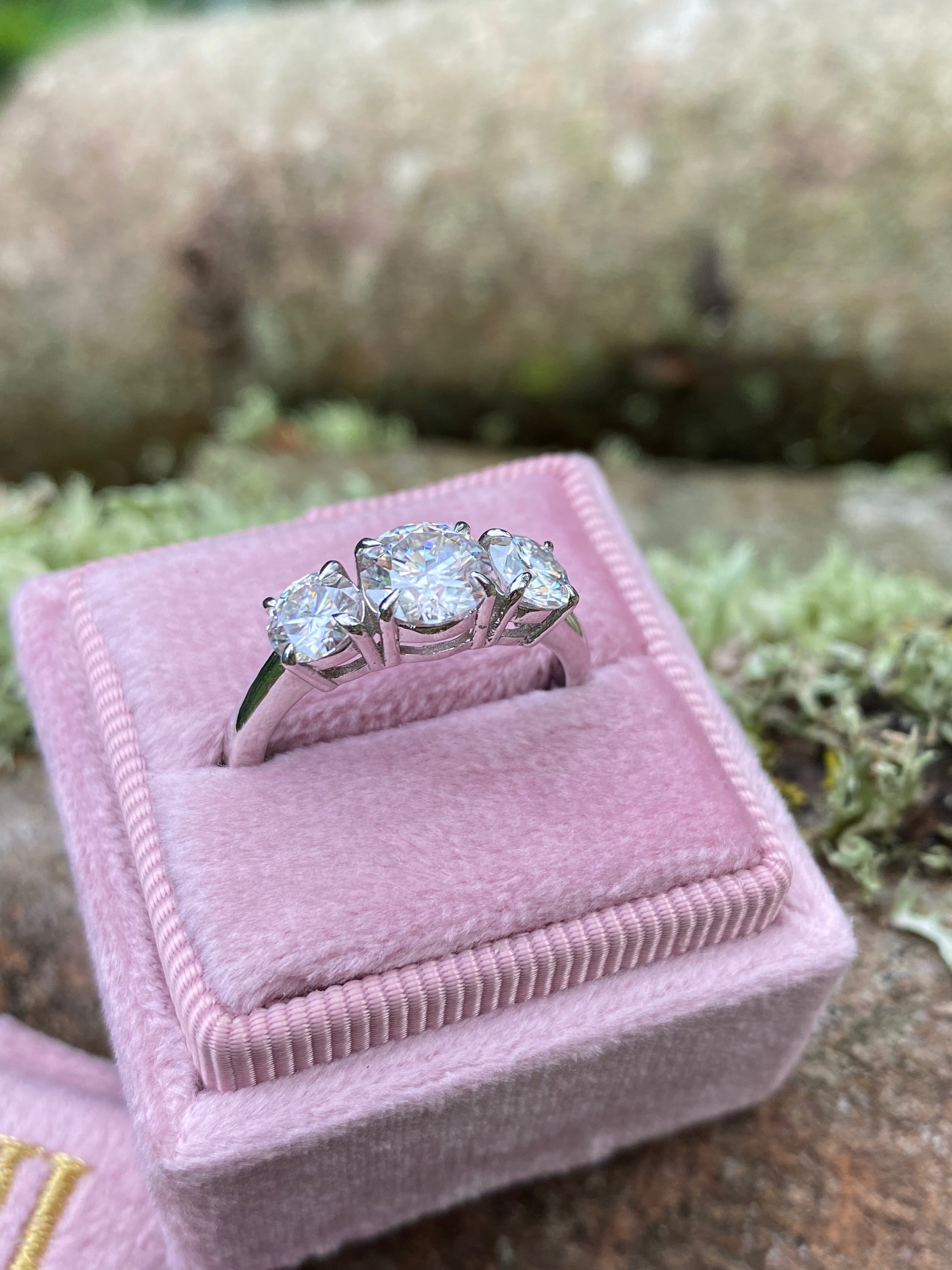 1.78 CTW Round Cut Moissanite Three Stone Ring in Sterling Silver