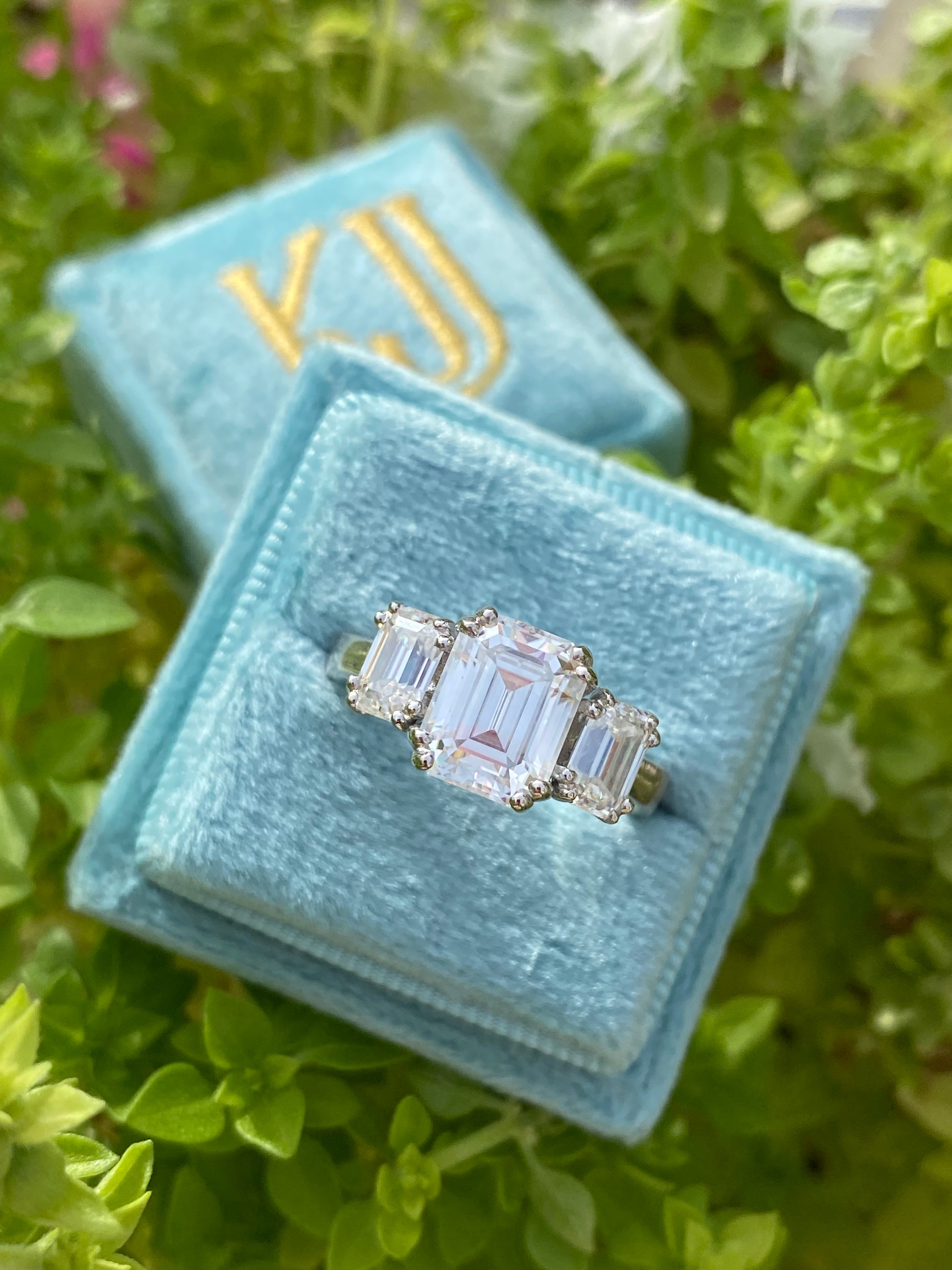 3.50 CTW Emerald Cut Moissanite Three Stone Ring in Sterling Silver