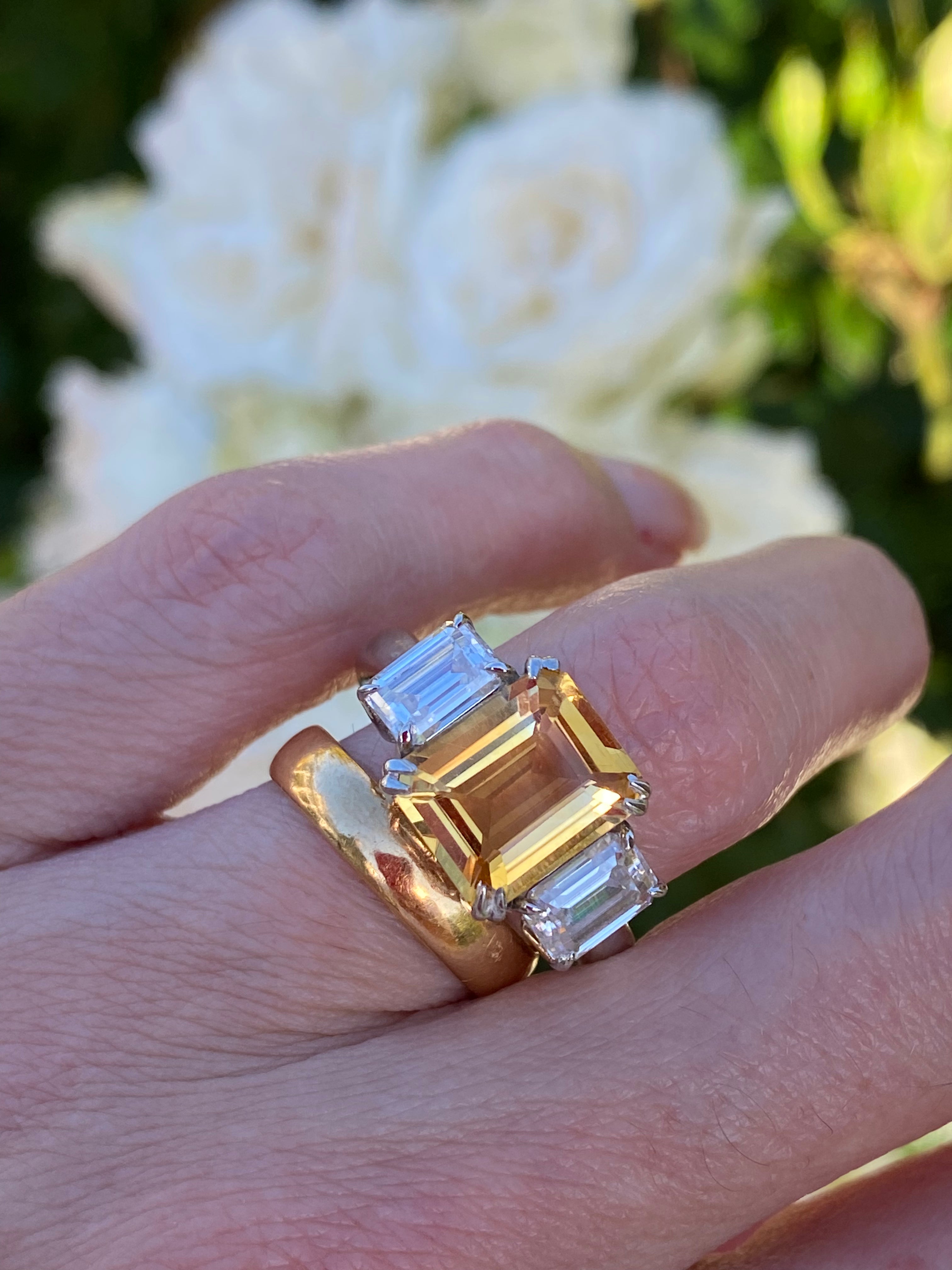 3.83 Carat Emerald Cut Citrine and 1.20 Carat Moissanite Three Stone Ring in Sterling Silver