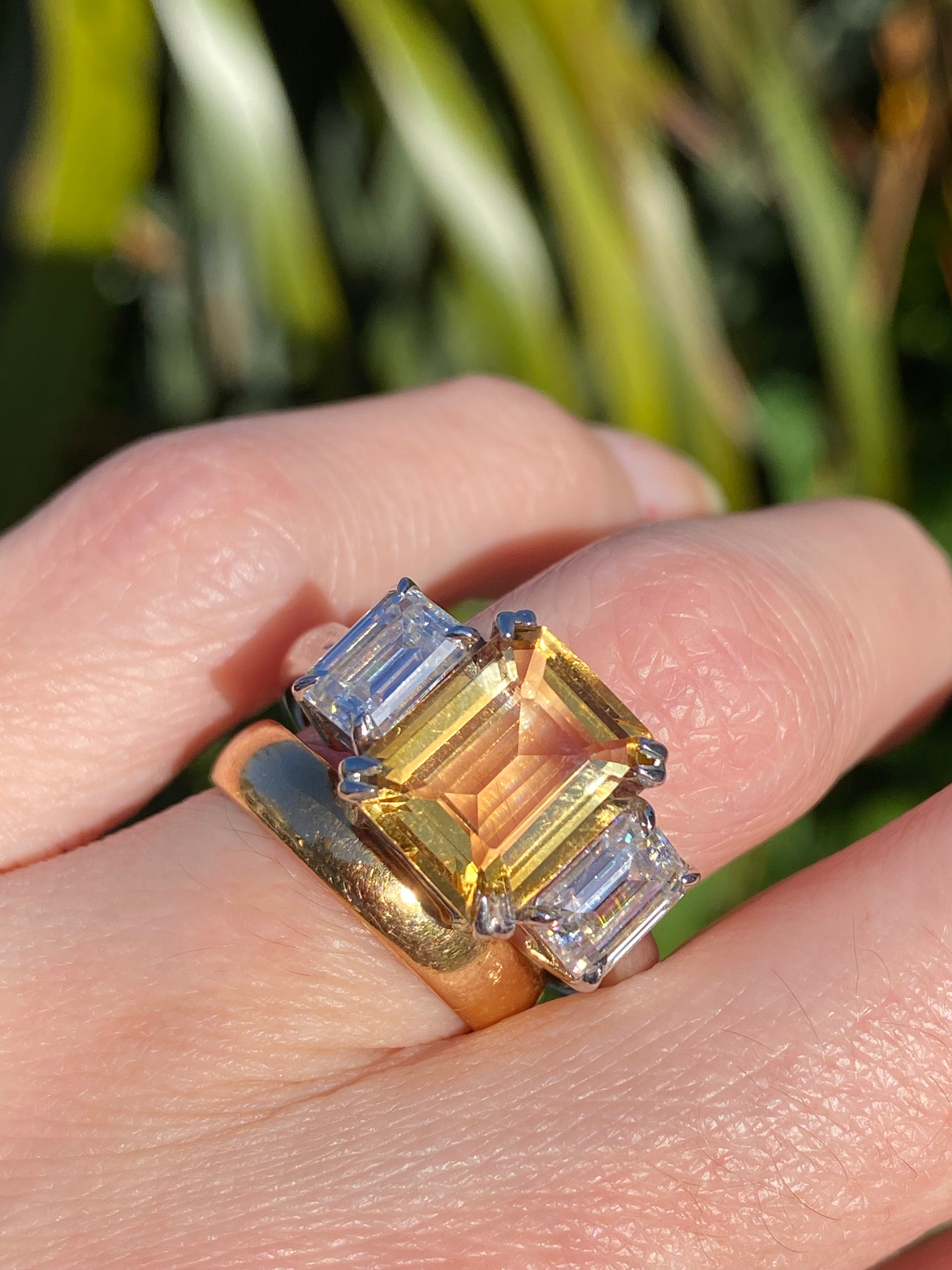 3.83 Carat Emerald Cut Citrine and 1.20 Carat Moissanite Three Stone Ring in Sterling Silver