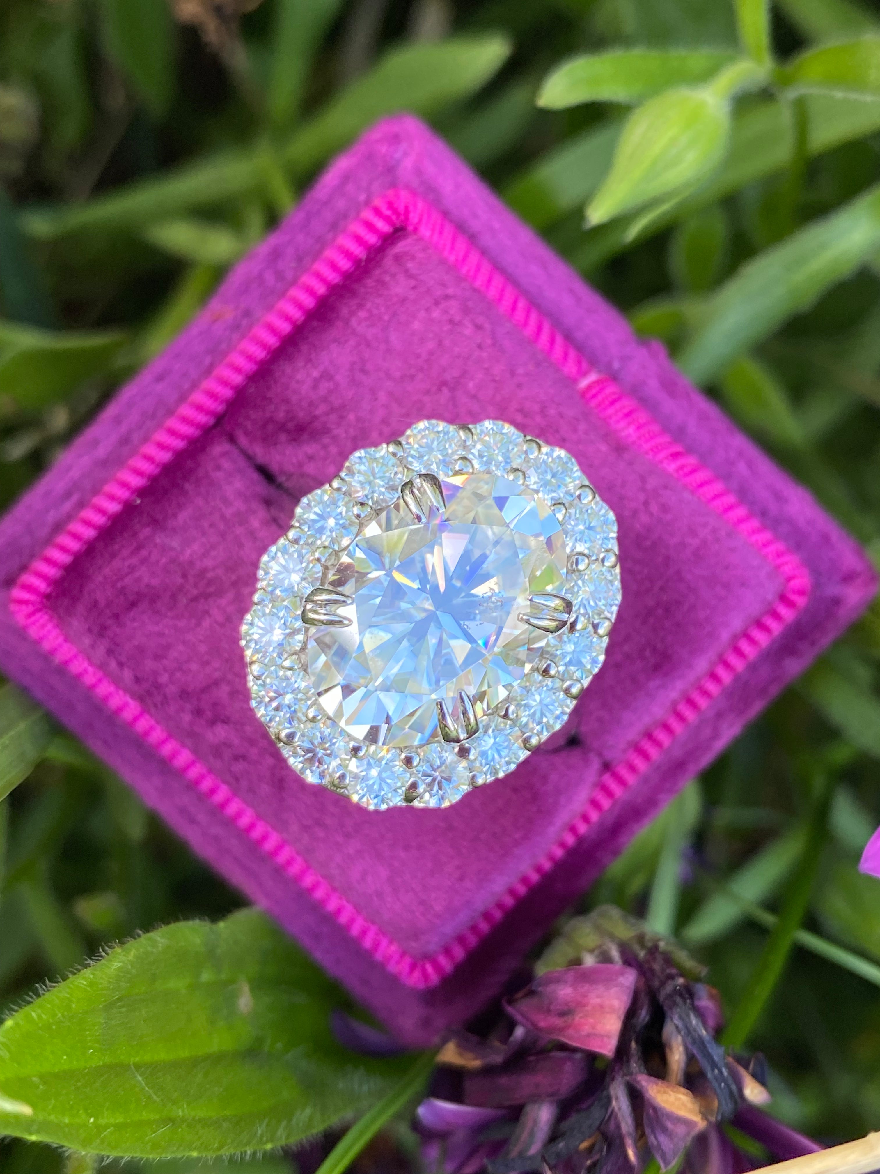 8.62 CTW Oval Cut Moissanite Halo Ring in Sterling Silver