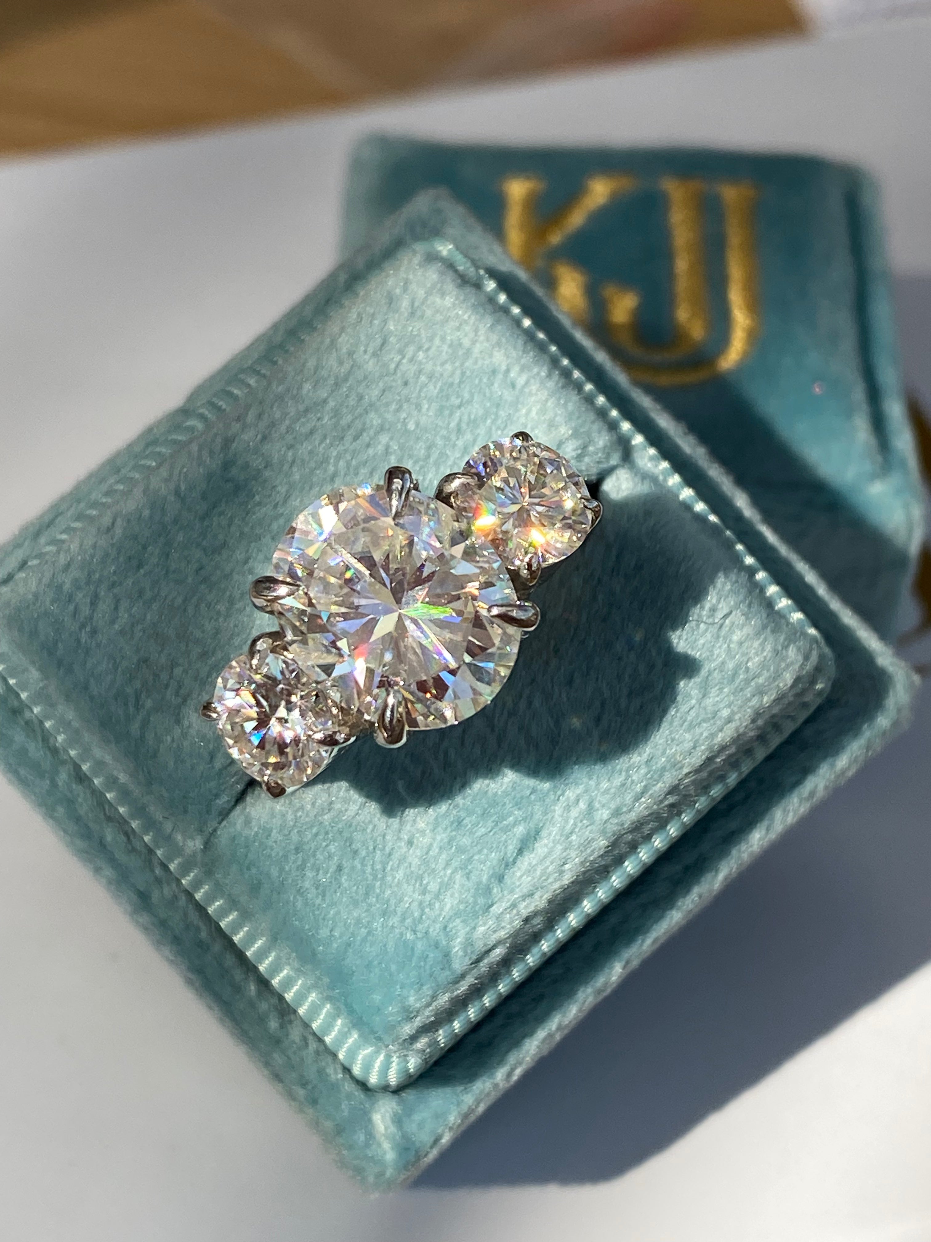 5.65 CTW Oval Cut Moissanite Three Stone Engagement Ring in Sterling Silver