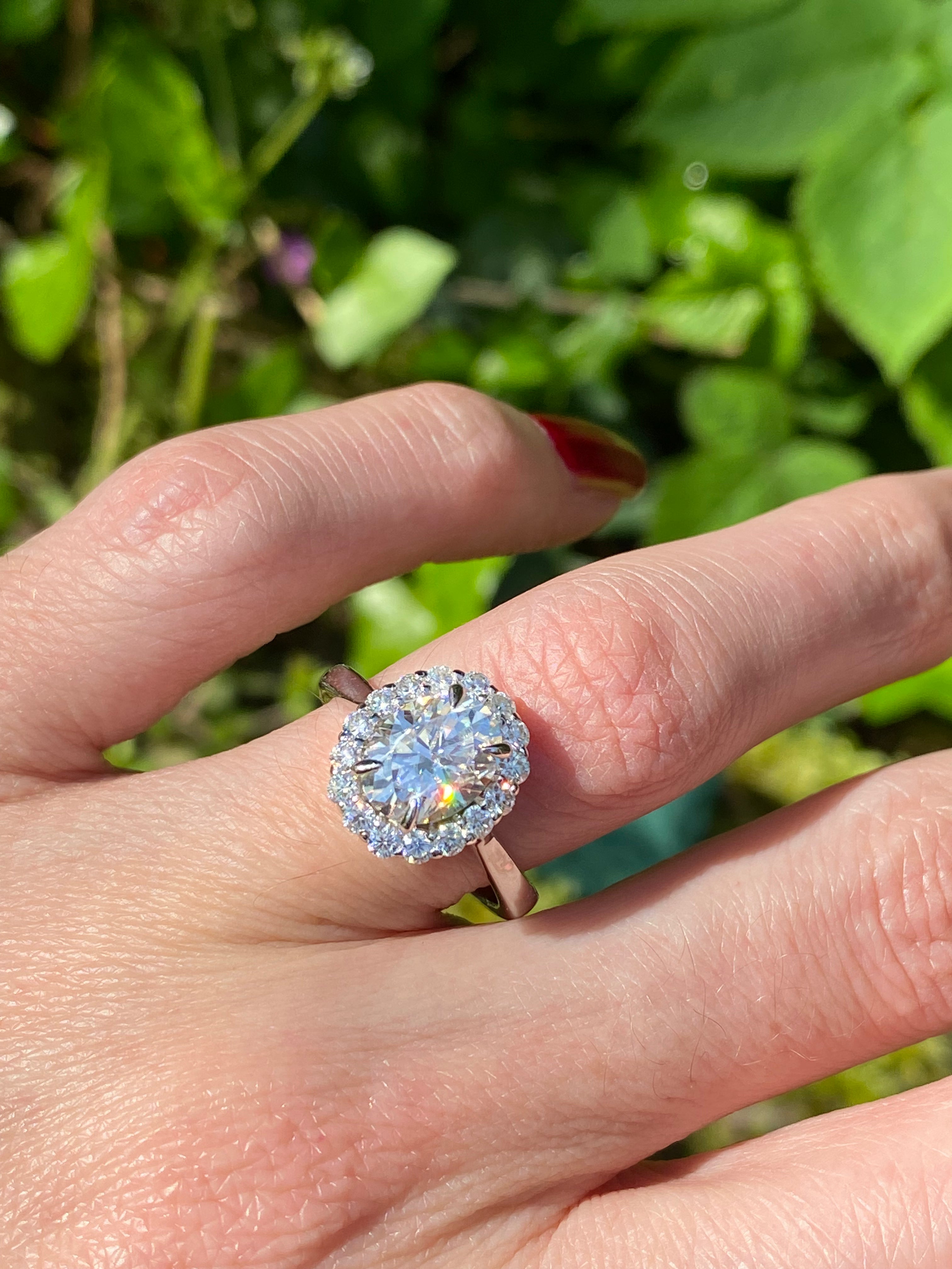 2.52 Carat Oval Cut Moissanite Halo Ring in Sterling Silver