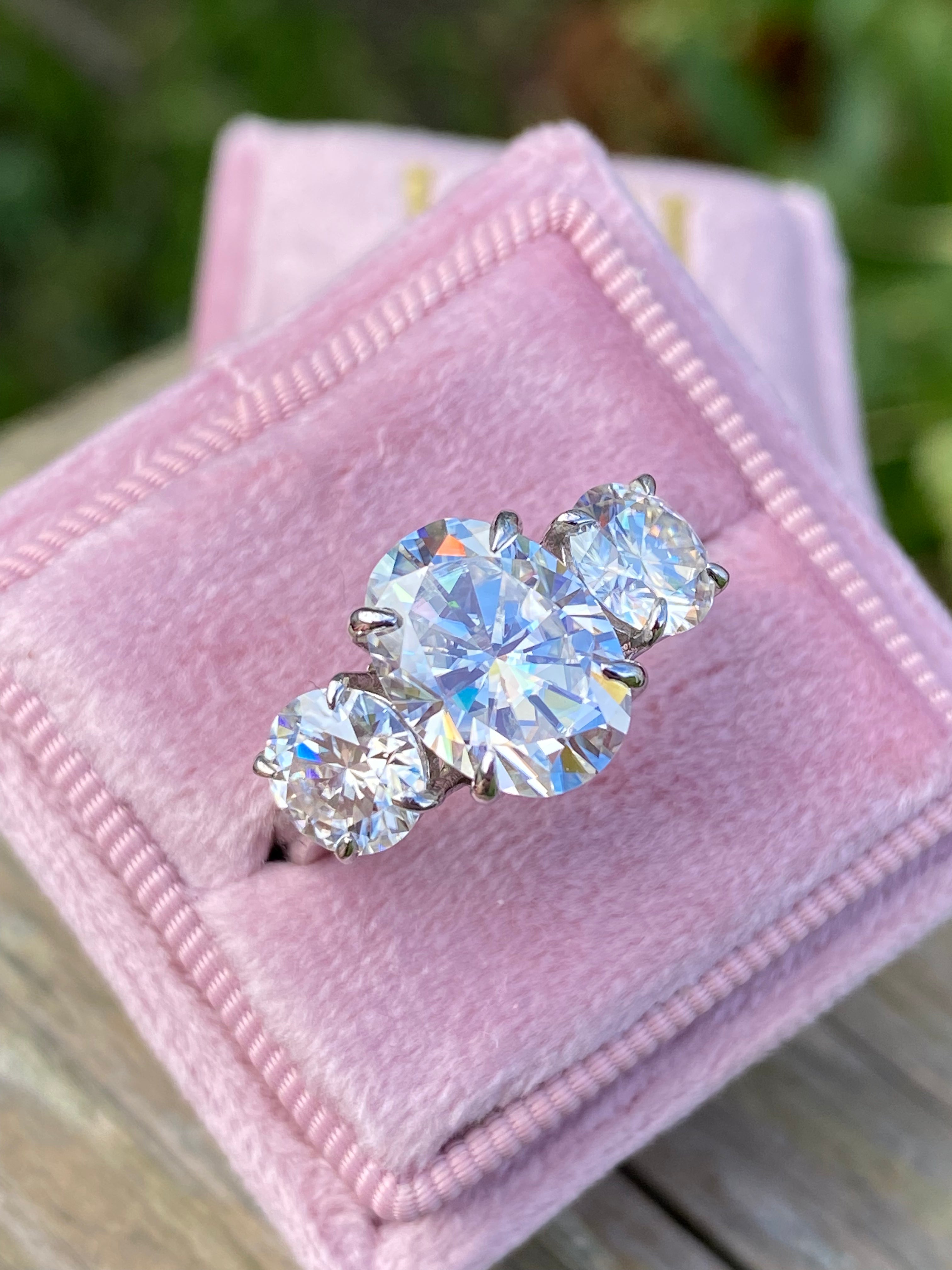 5.16 CTW Oval Cut Moissanite Three Stone Engagement Ring in Sterling Silver
