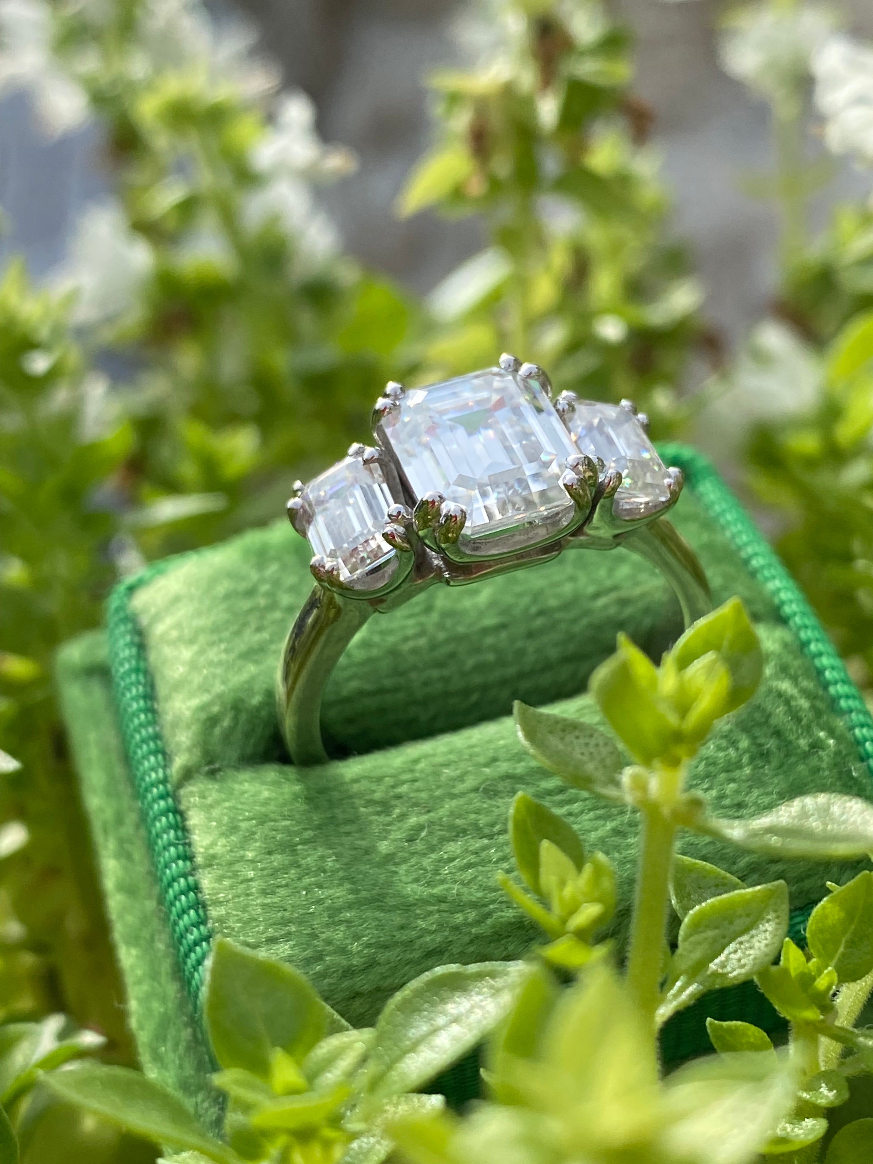 3.50 CTW Emerald Cut Moissanite Three Stone Ring in Sterling Silver