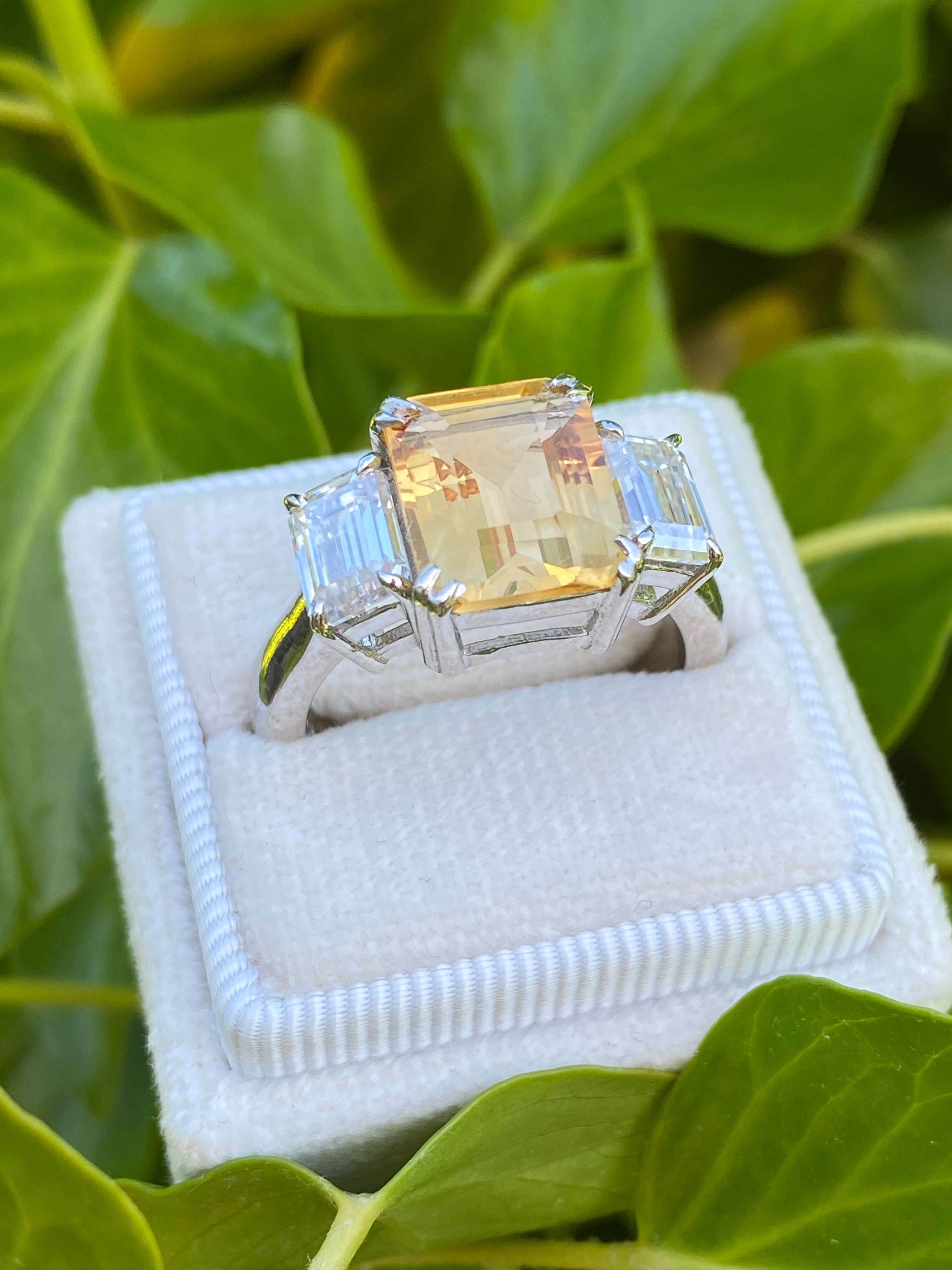 3.83 Carat Emerald Cut Citrine and 1.20 Carat Moissanite Three Stone Ring in Sterling Silver