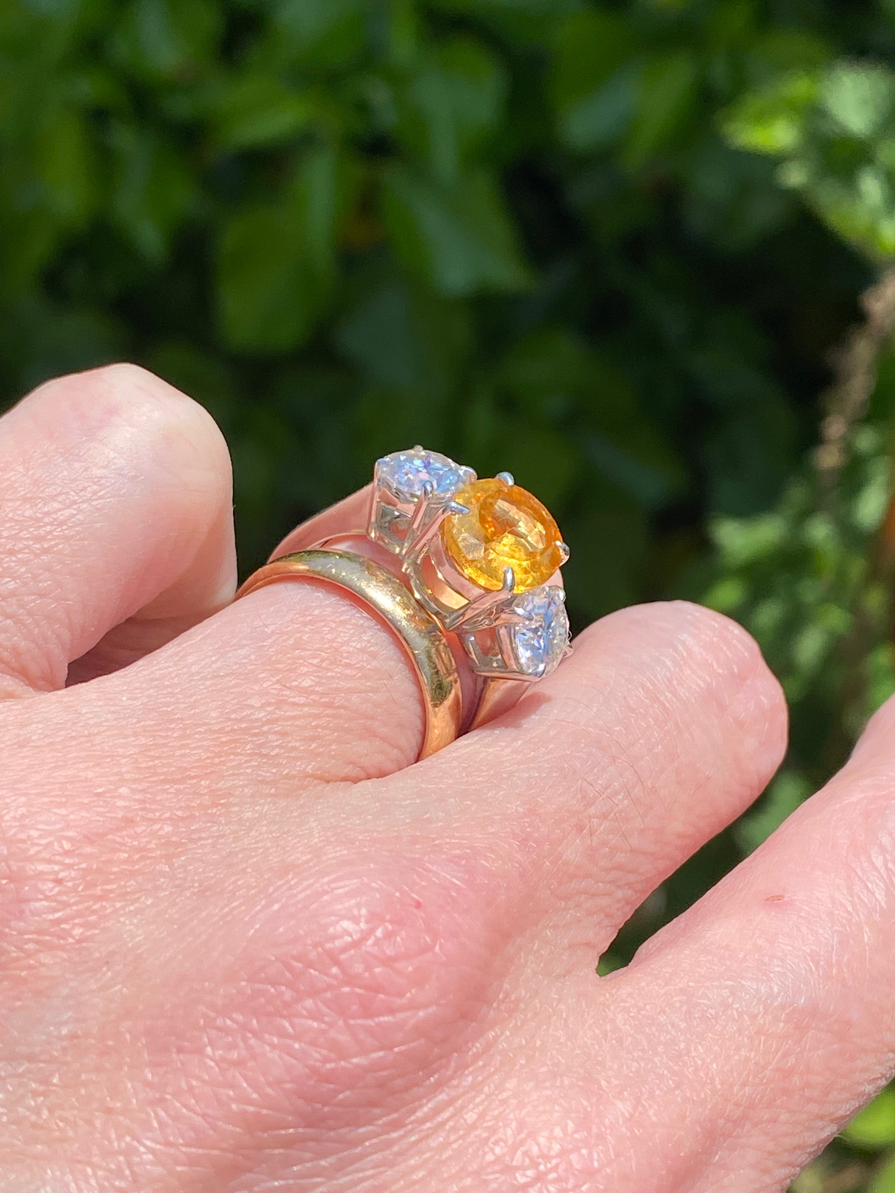 2.66 Carat Oval Cut Citrine and 1.85 Carat Moissanite Three Stone Ring in Sterling Silver
