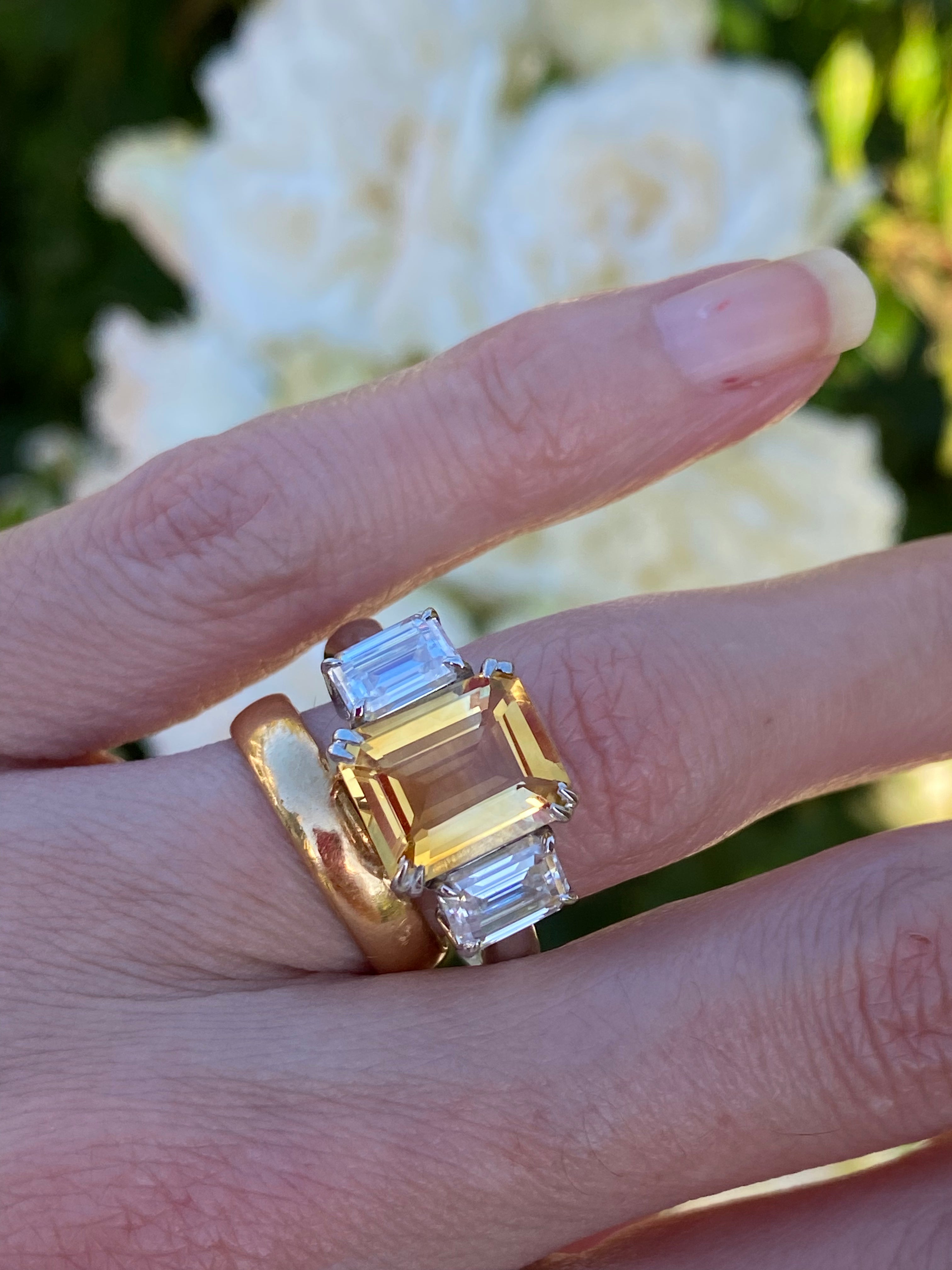 3.83 Carat Emerald Cut Citrine and 1.20 Carat Moissanite Three Stone Ring in Sterling Silver