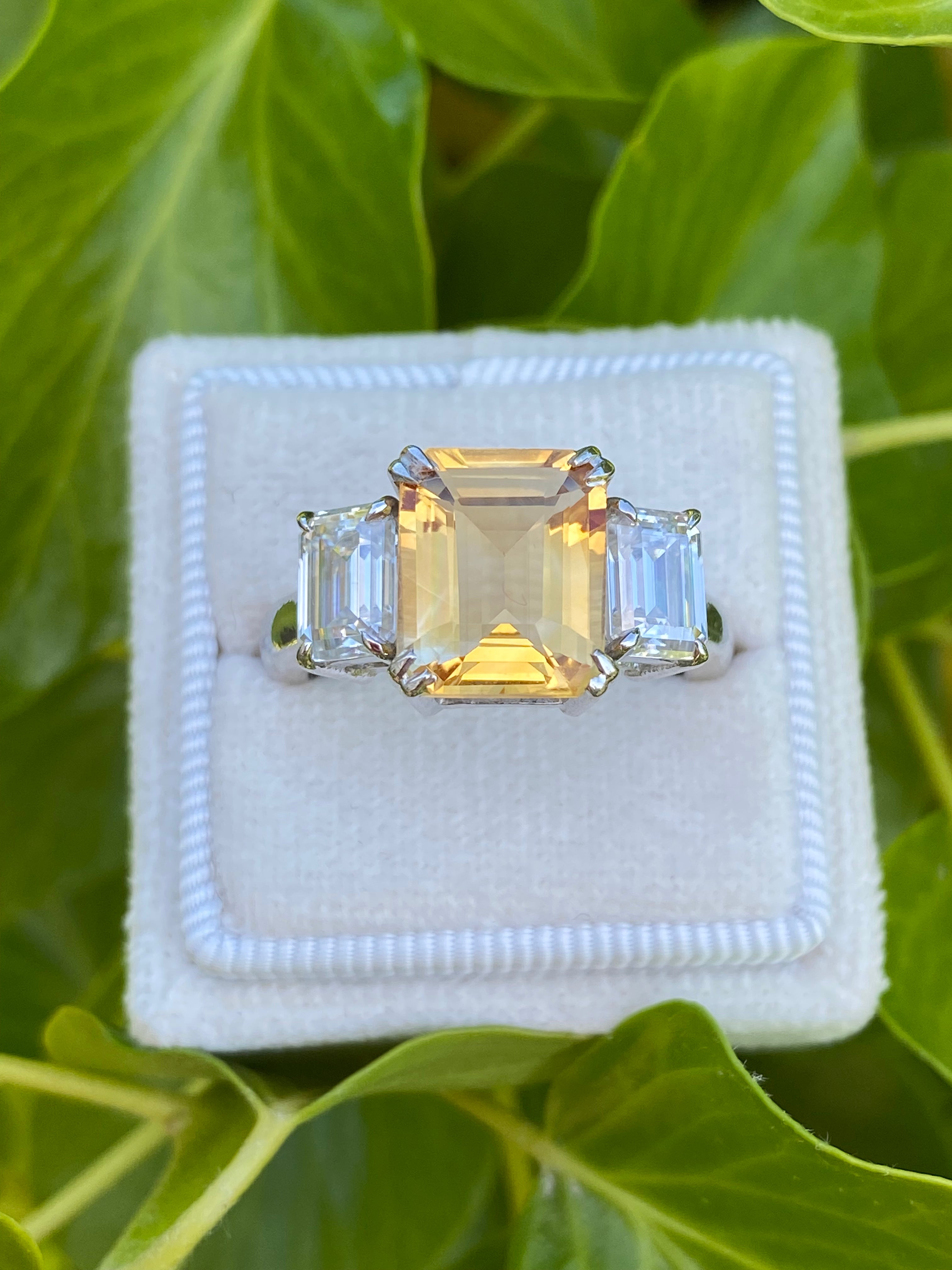 3.83 Carat Emerald Cut Citrine and 1.20 Carat Moissanite Three Stone Ring in Sterling Silver
