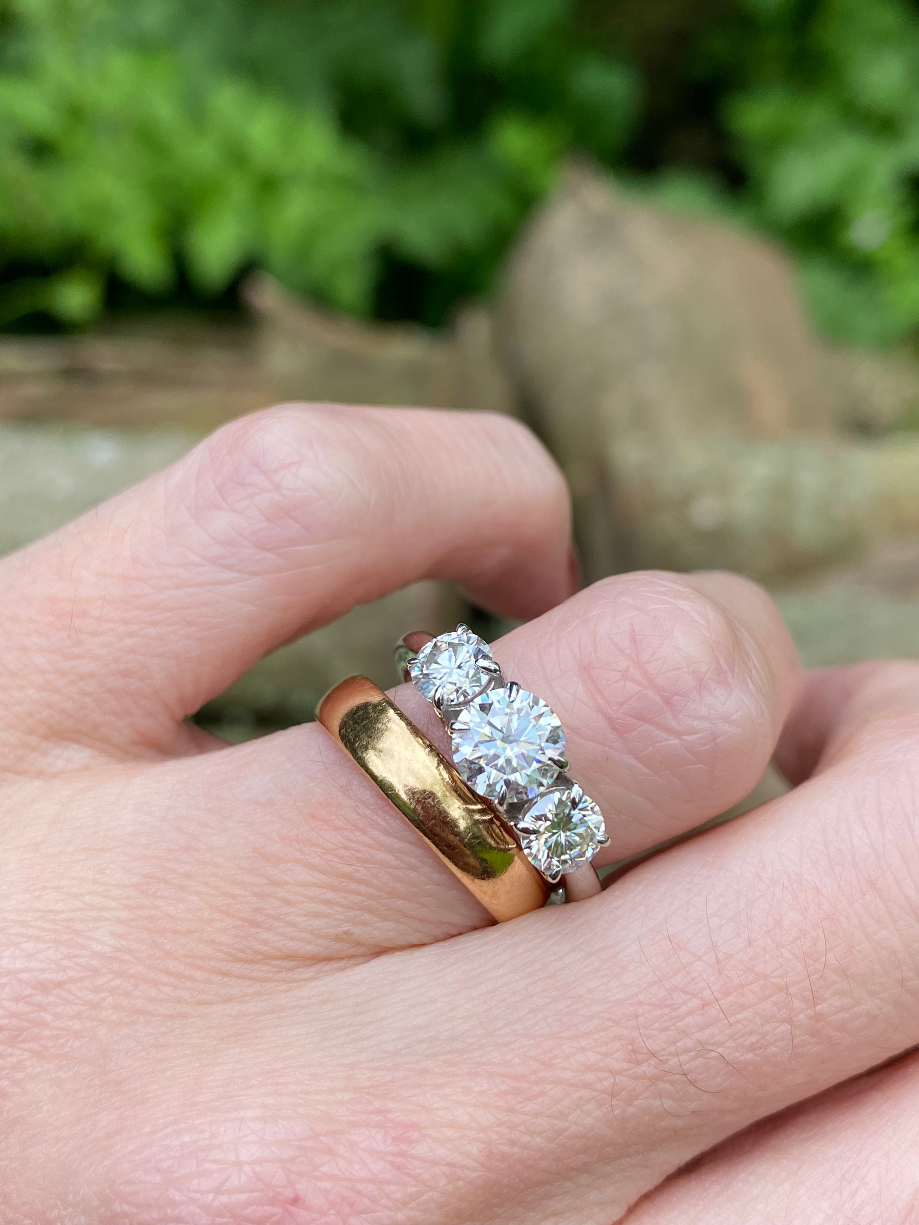 1.78 CTW Round Cut Moissanite Three Stone Ring in Sterling Silver