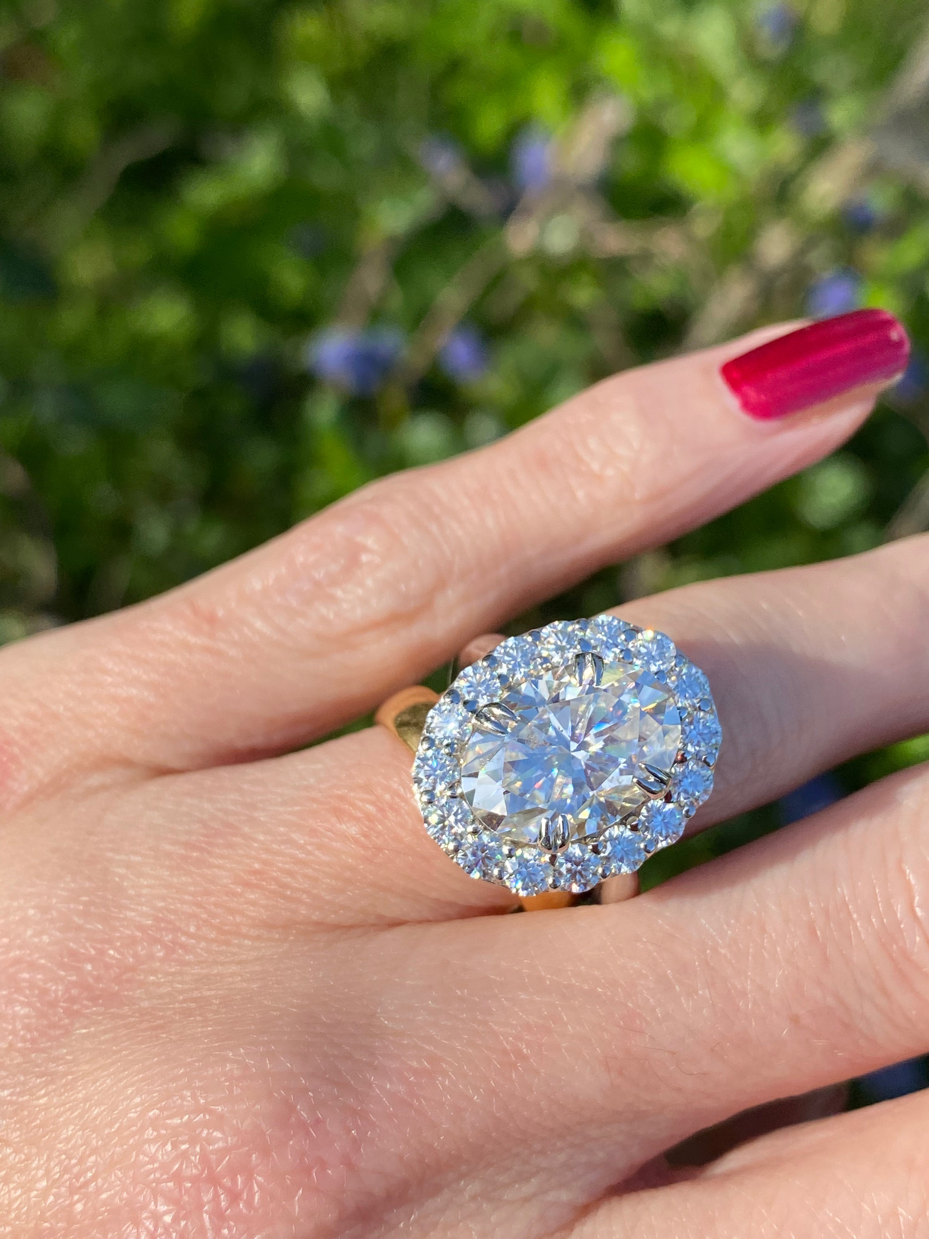 8.62 CTW Oval Cut Moissanite Halo Ring in Sterling Silver