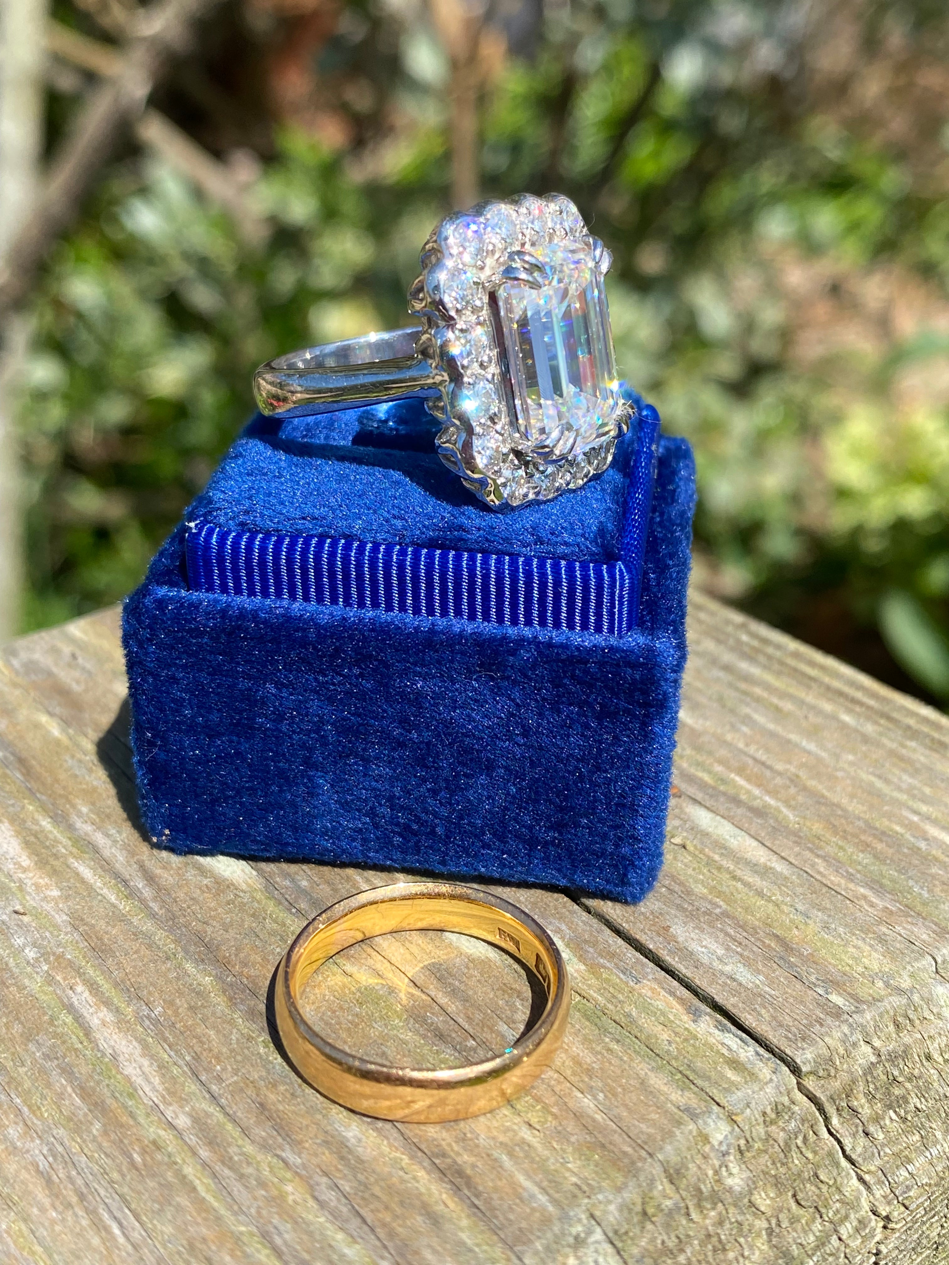 10.06 Carat Emerald Cut Moissanite Halo Engagement Ring in Sterling Silver