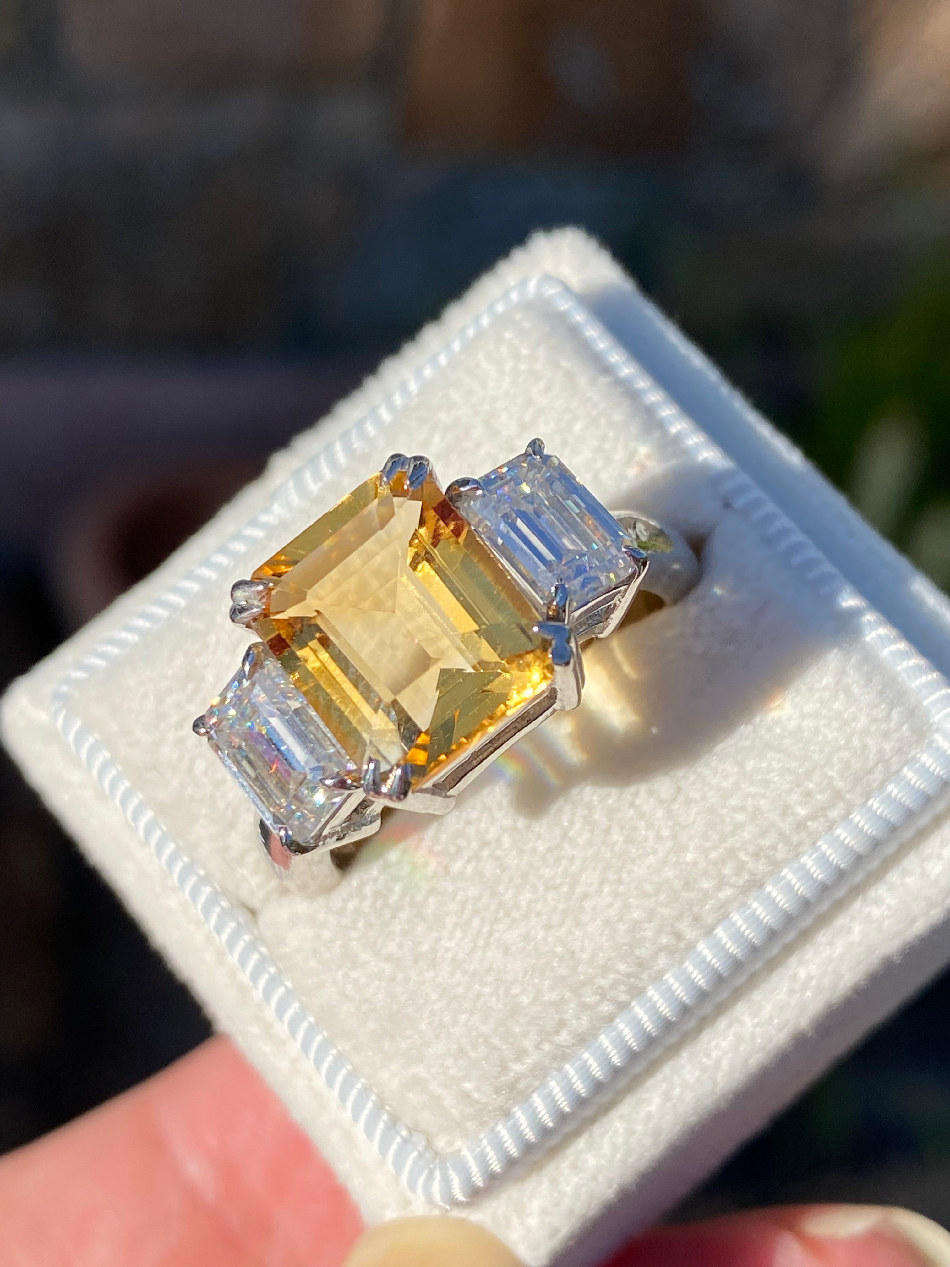 3.83 Carat Emerald Cut Citrine and 1.20 Carat Moissanite Three Stone Ring in Sterling Silver